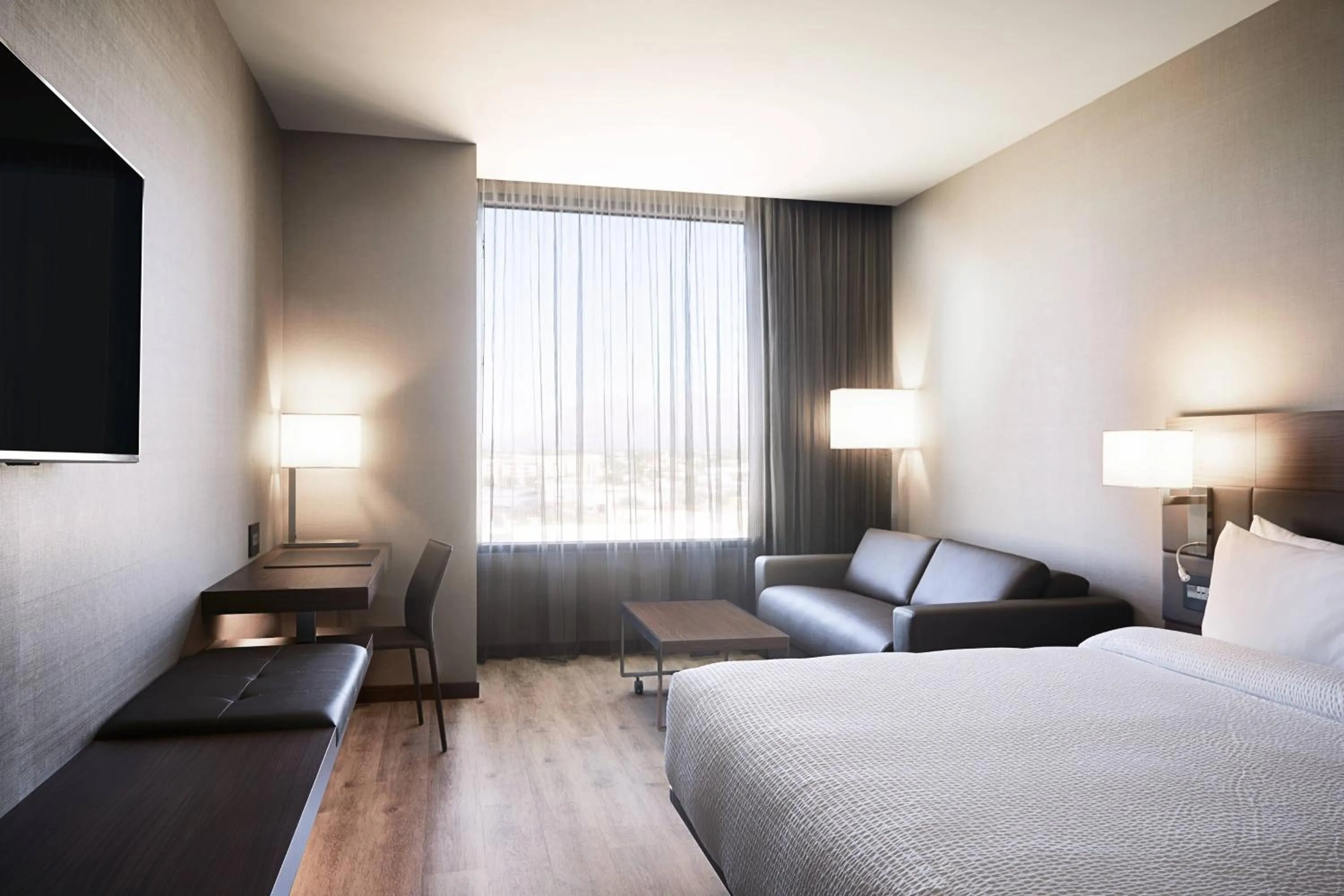 Photo of the whole room, Bed in AC Hotel Tucson Downtown