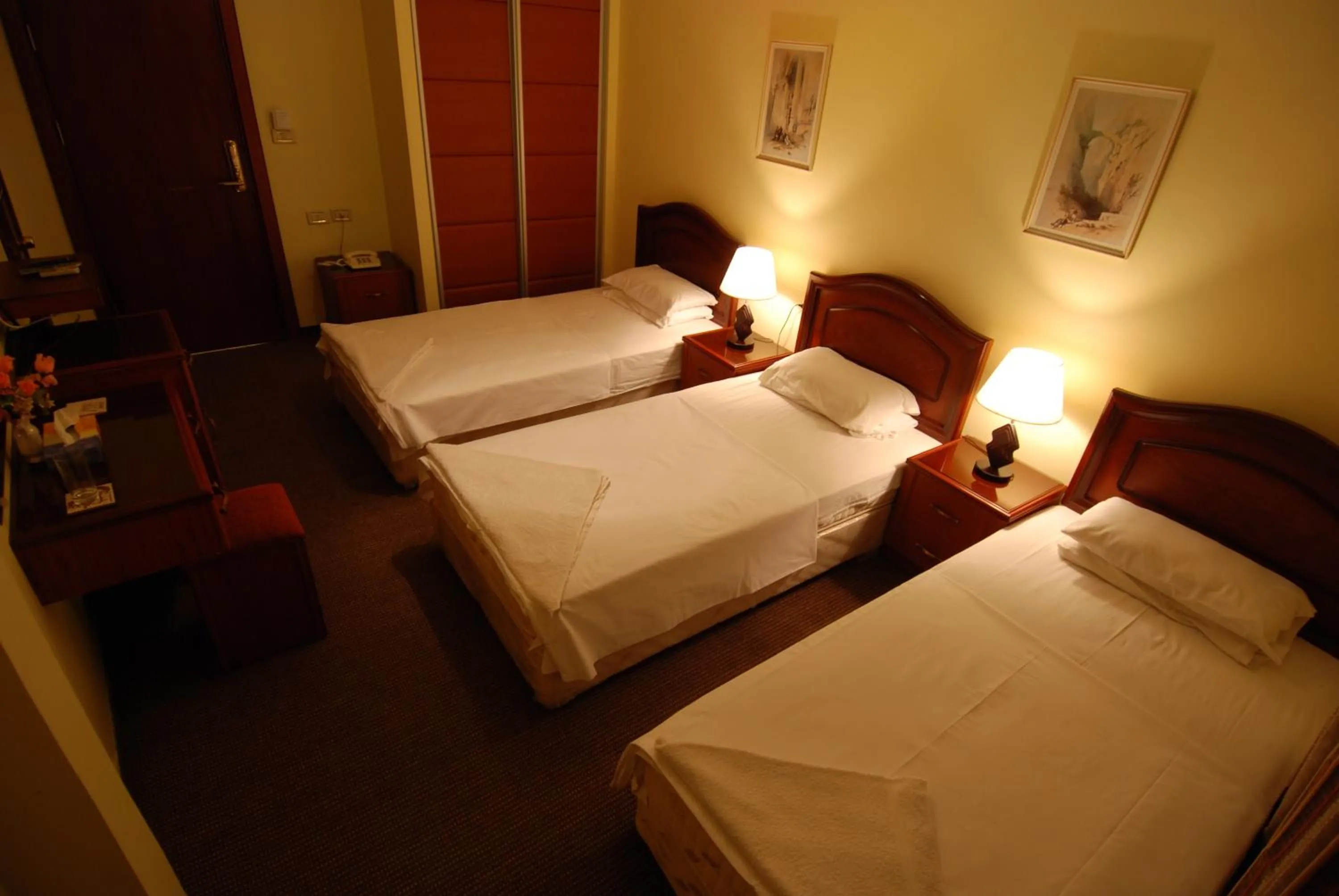 Bed in Al Rashid Hotel