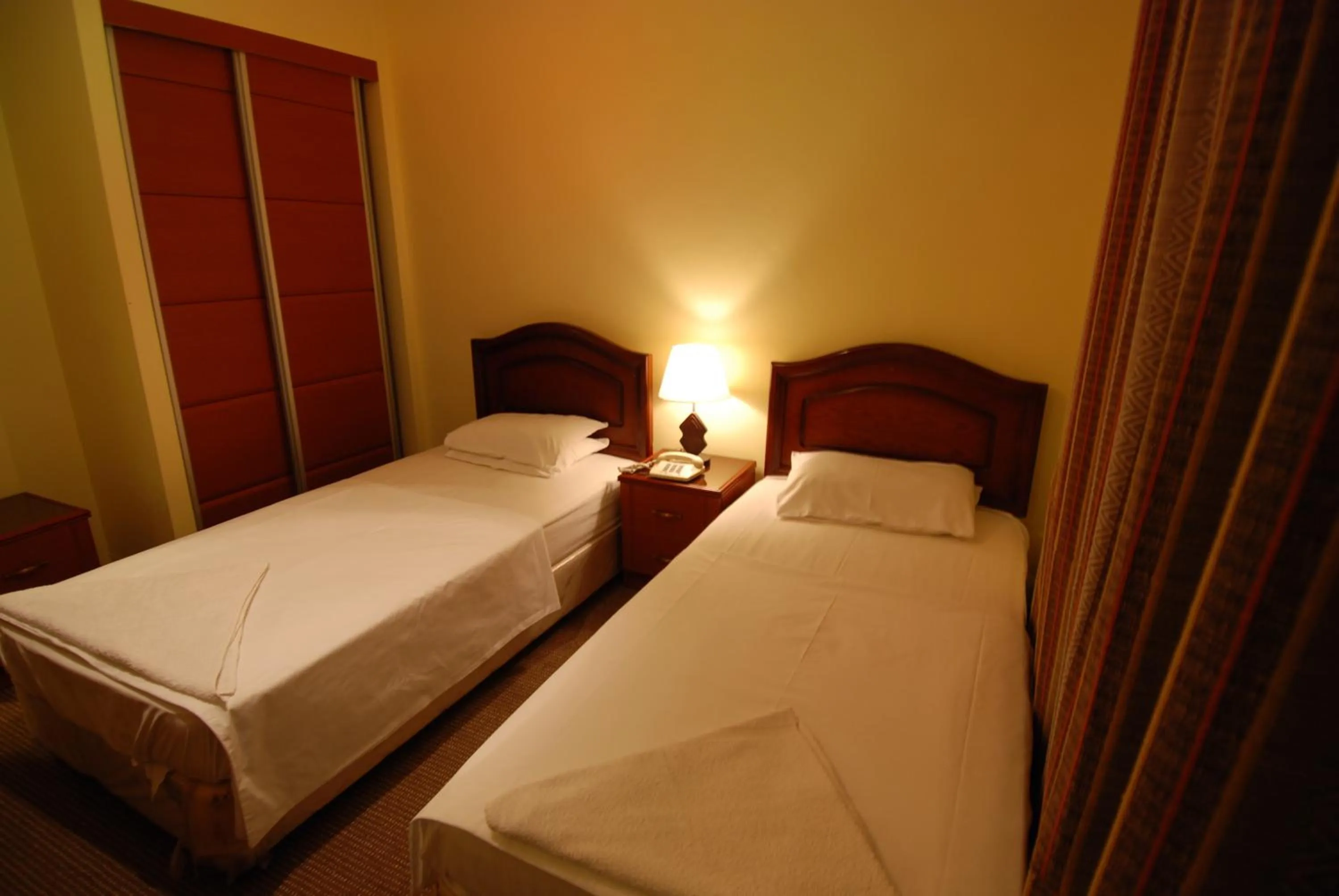 Bed in Al Rashid Hotel