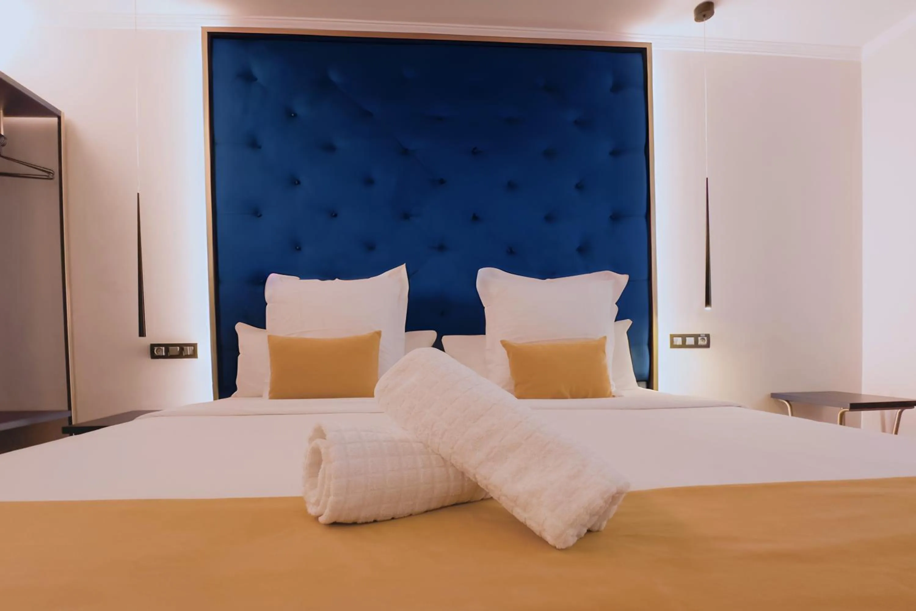 Bed in Design Plus Bex Hotel