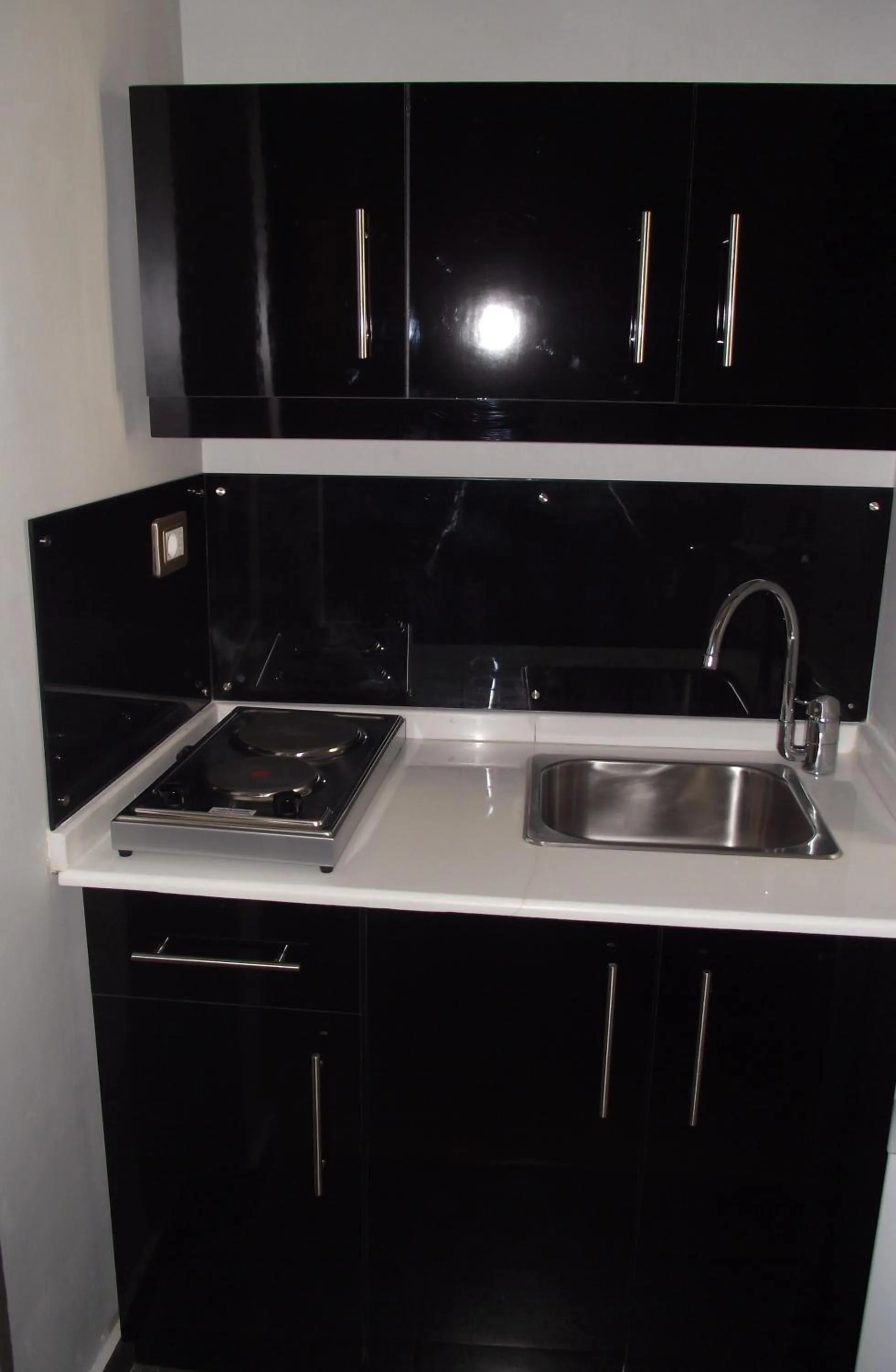Kitchen or kitchenette in Crystal Suites