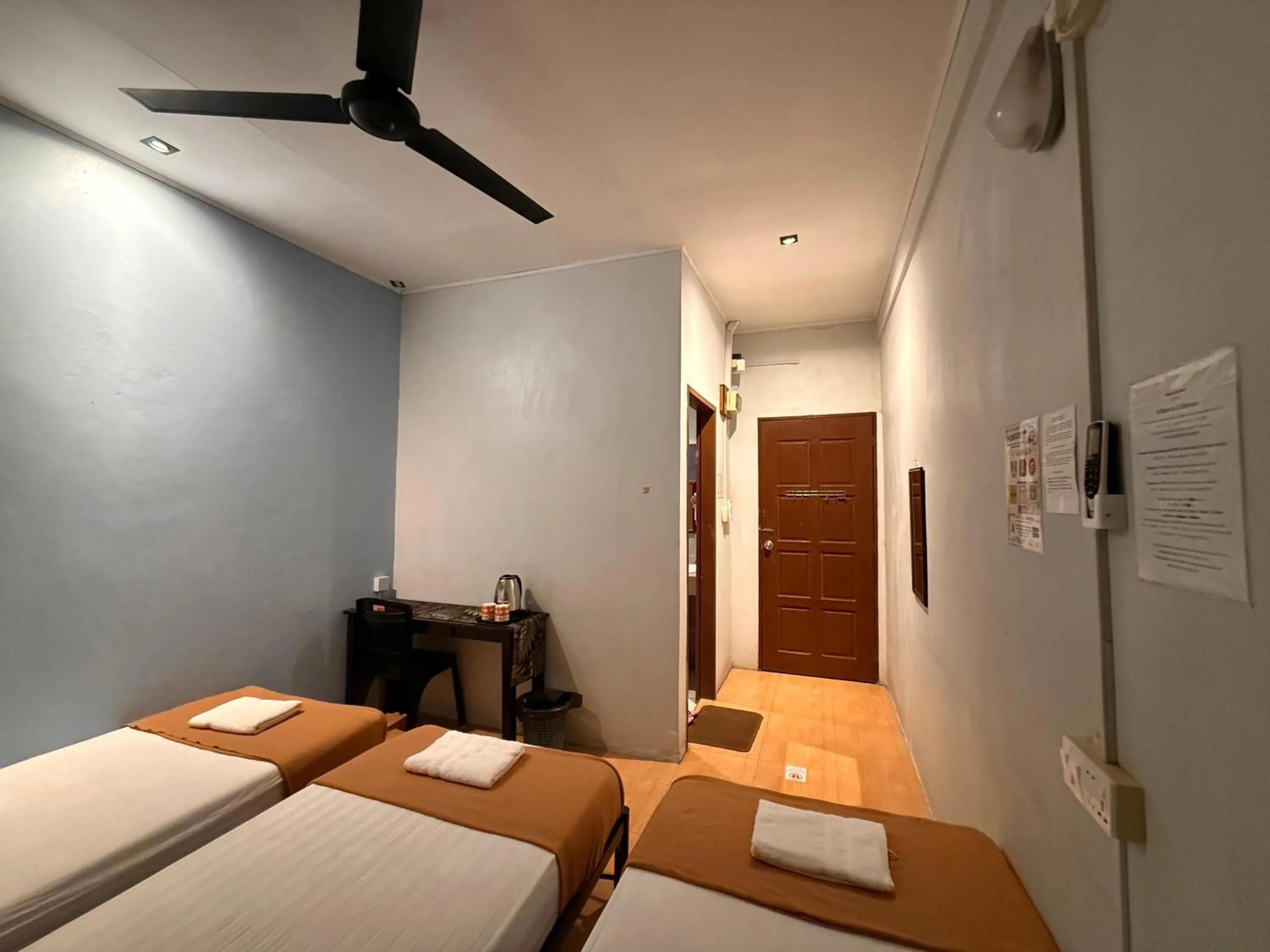 Bed in RTMS Guesthouse Semporna