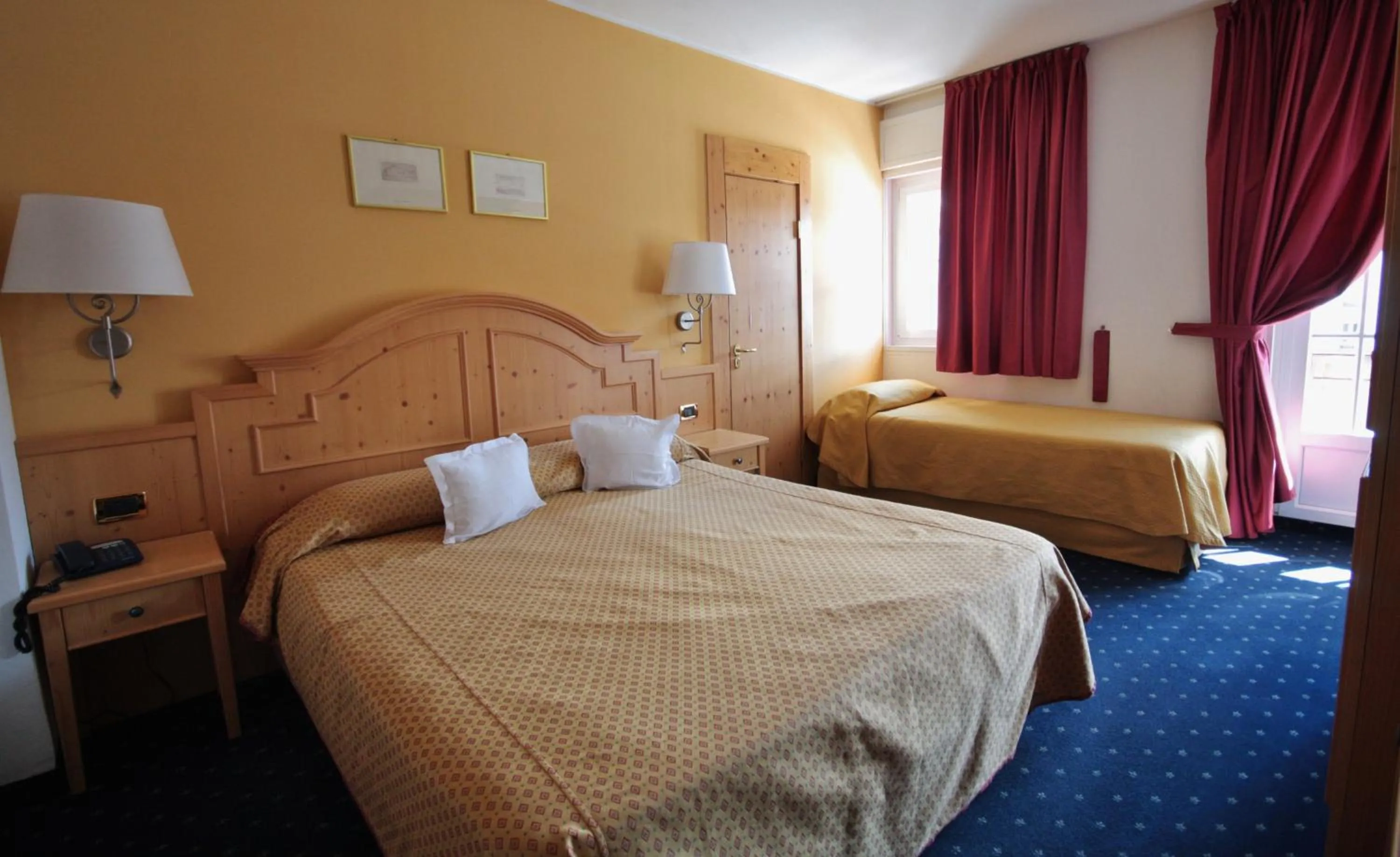 Bed in Hotel La Meridiana