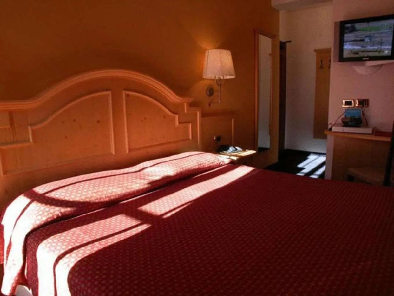 Bed in Hotel La Meridiana