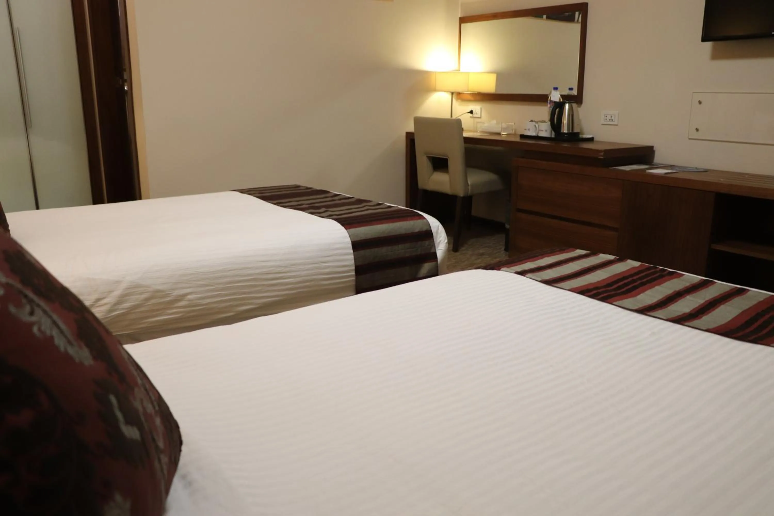 Photo of the whole room, Bed in Mamba Point Hotel