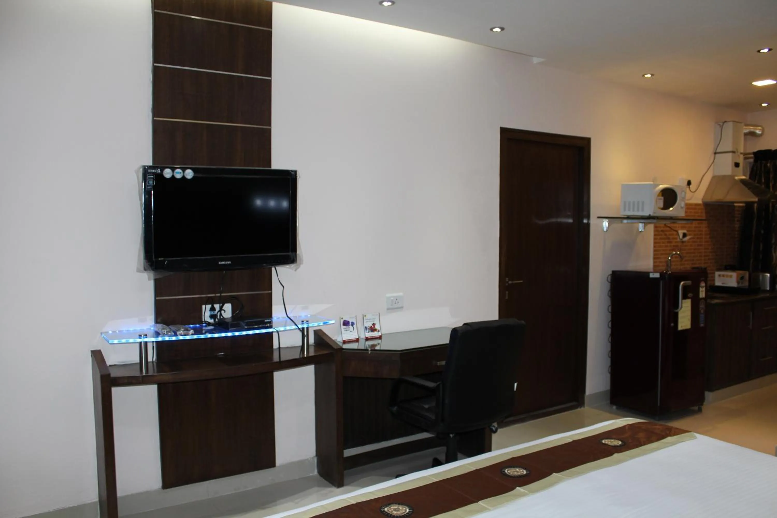 Bedroom in Maple Suites