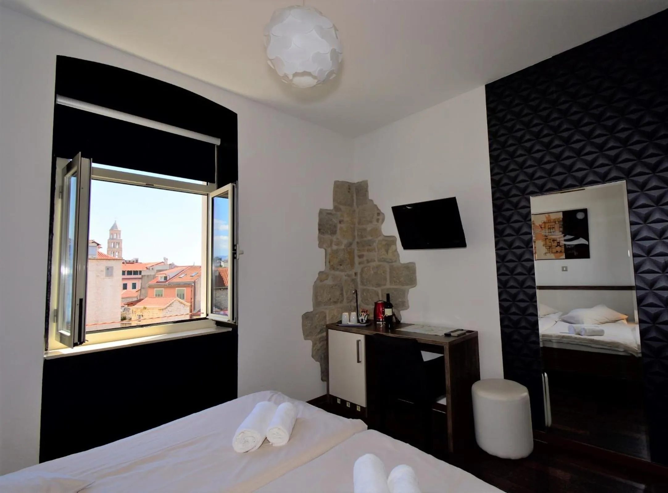 Bed in Marmontova Luxury Rooms
