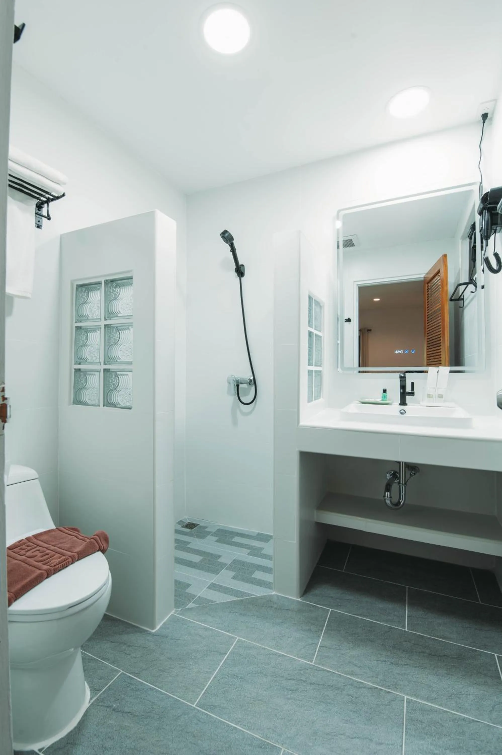 Toilet in Dolphin Bay Beach Resort