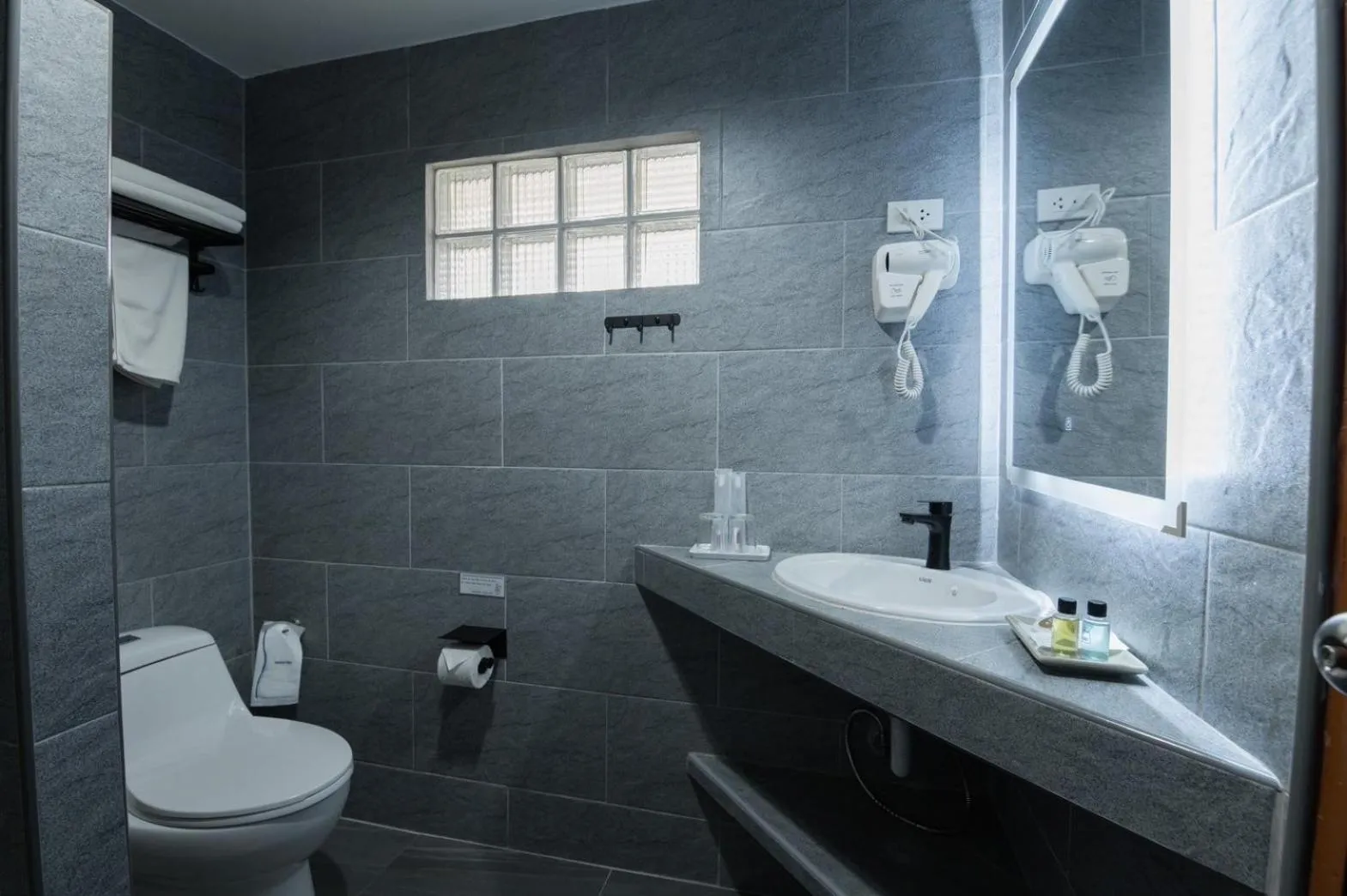 Toilet in Dolphin Bay Beach Resort