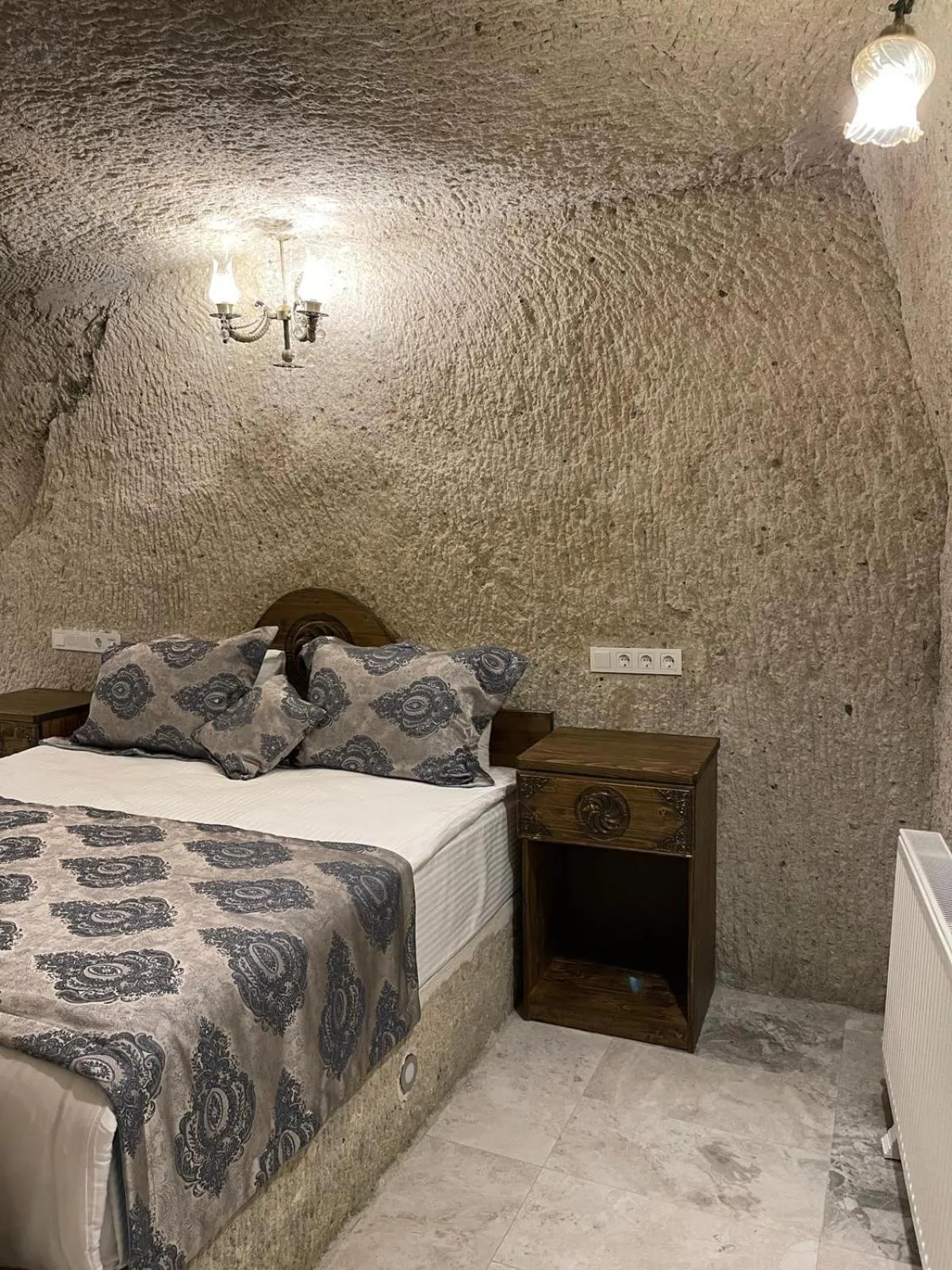 Bed in Cappadocia Empire Cave Hotel