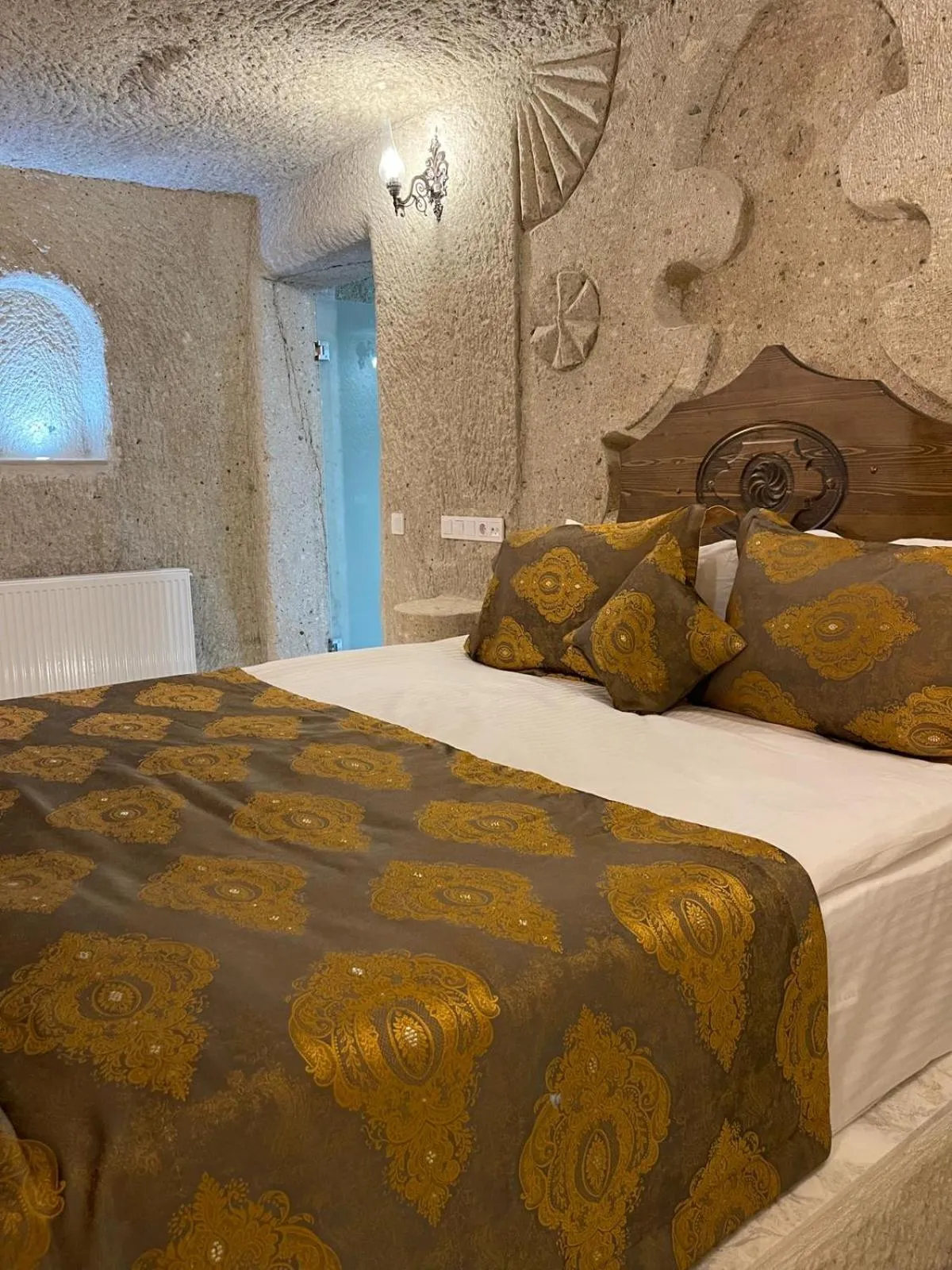 Bed in Cappadocia Empire Cave Hotel