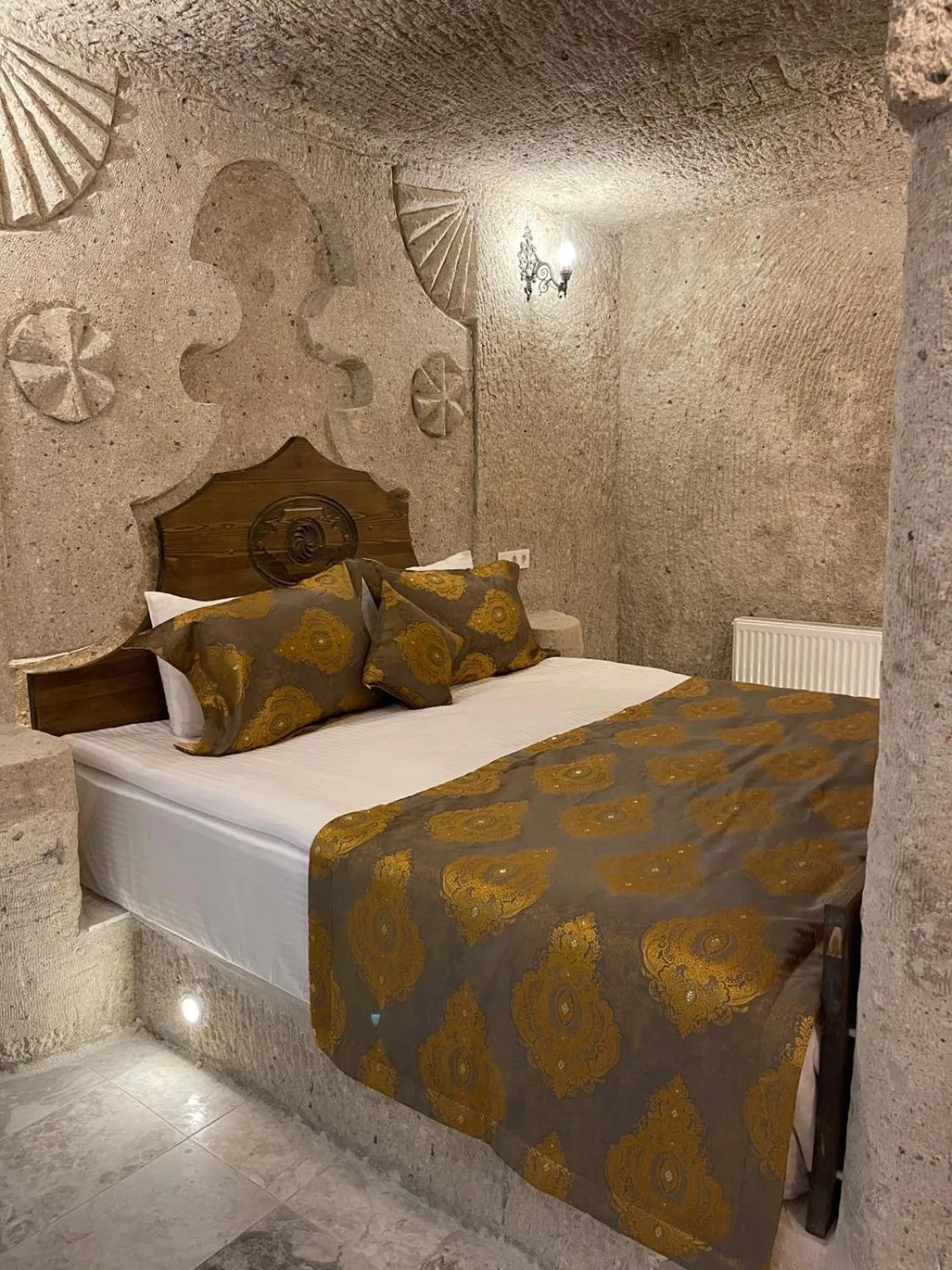 Bed in Cappadocia Empire Cave Hotel