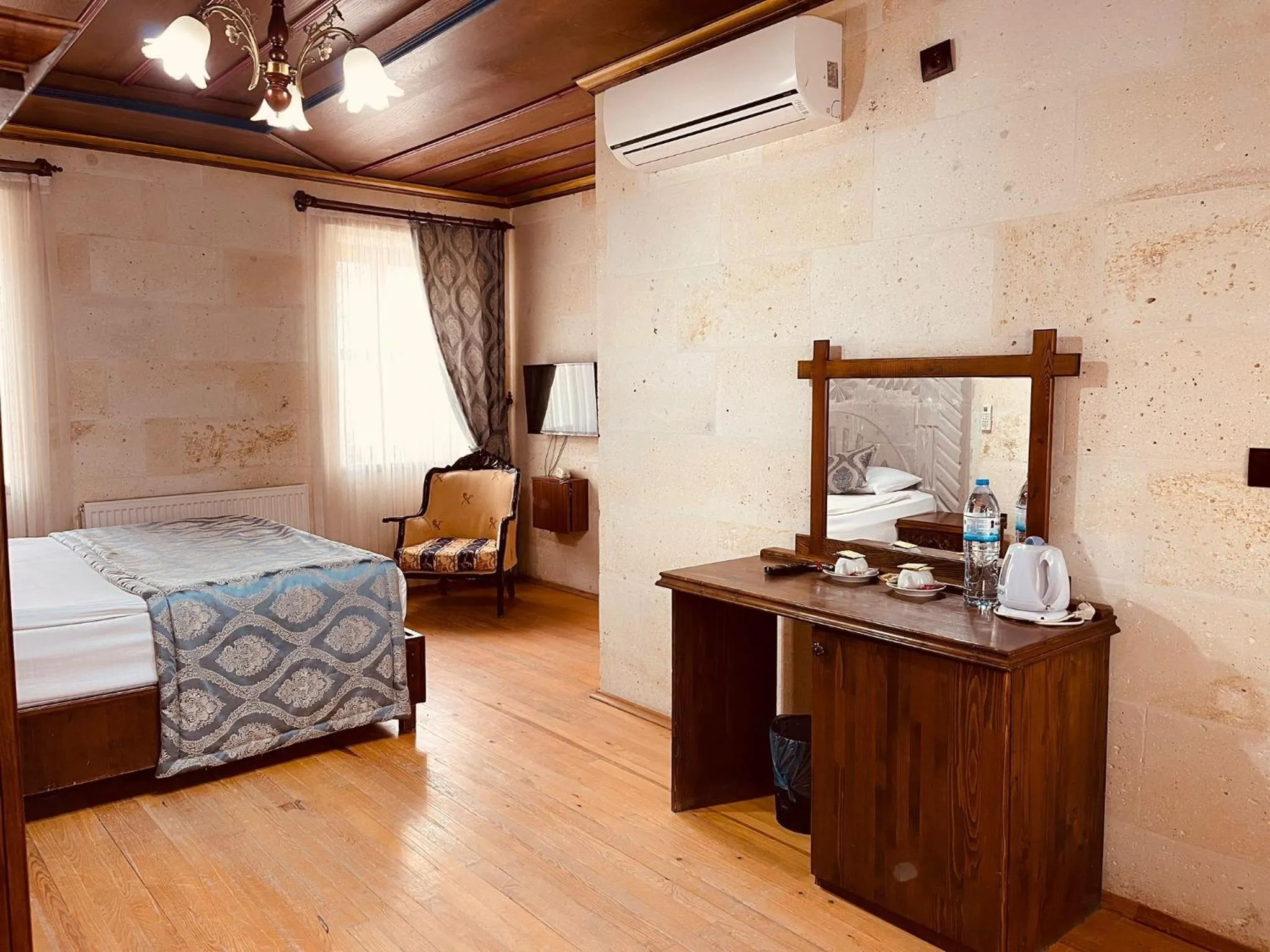 Bed in Cappadocia Empire Cave Hotel