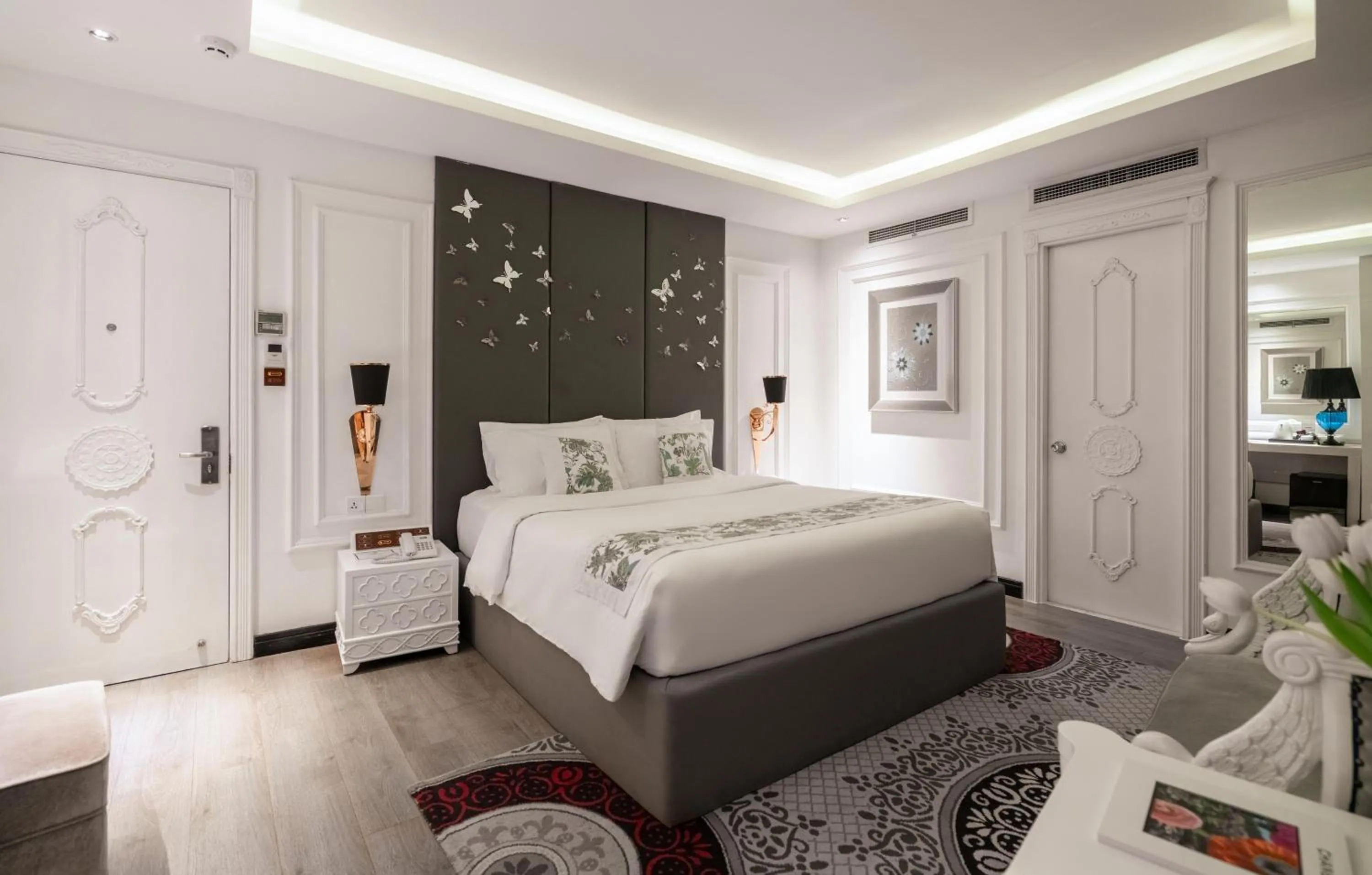 Bed in A&EM Saigon Hotel