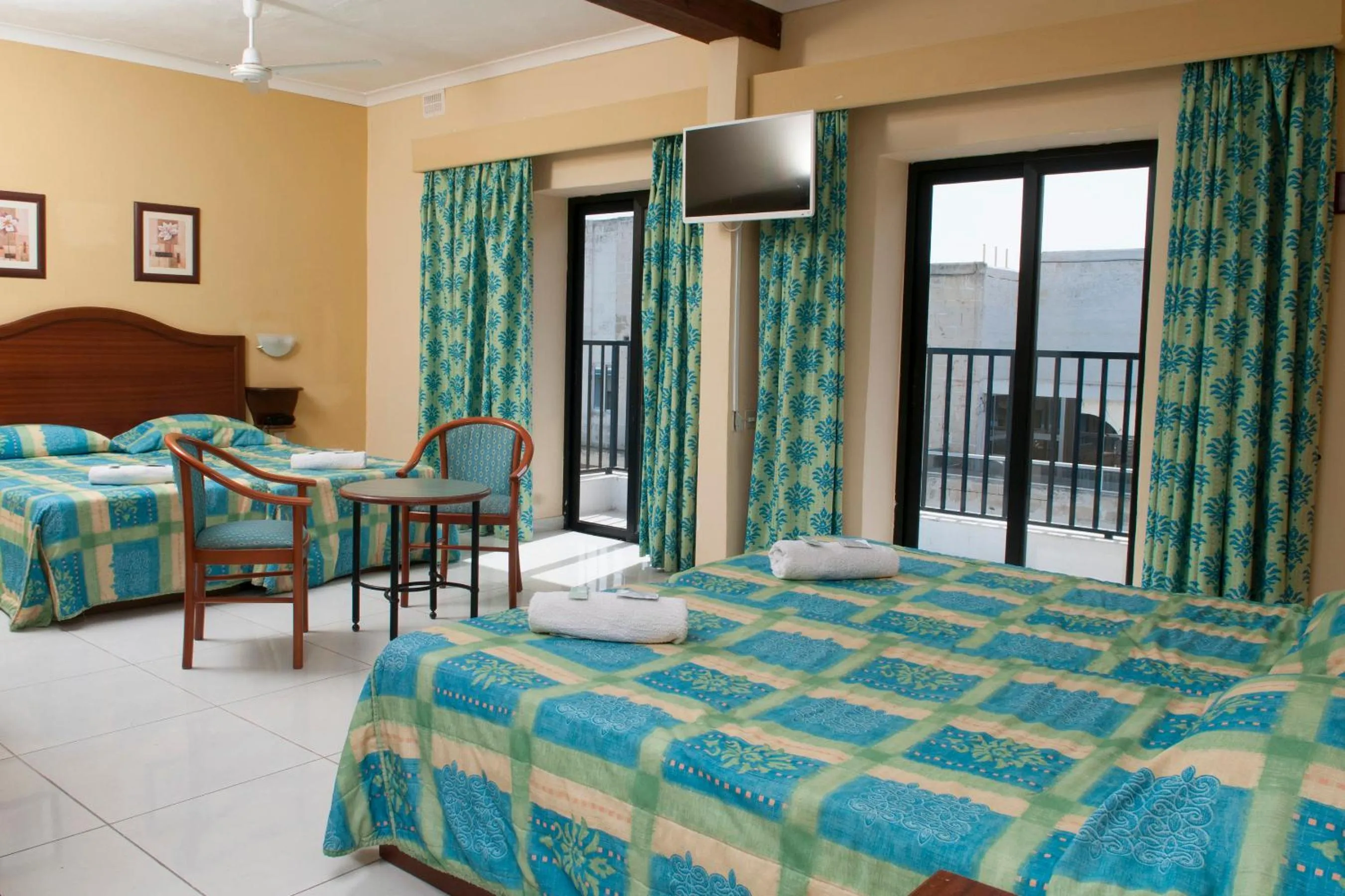 Quadruple Room with Balcony and Airport Shuttle included in EUROCLUB Hotel