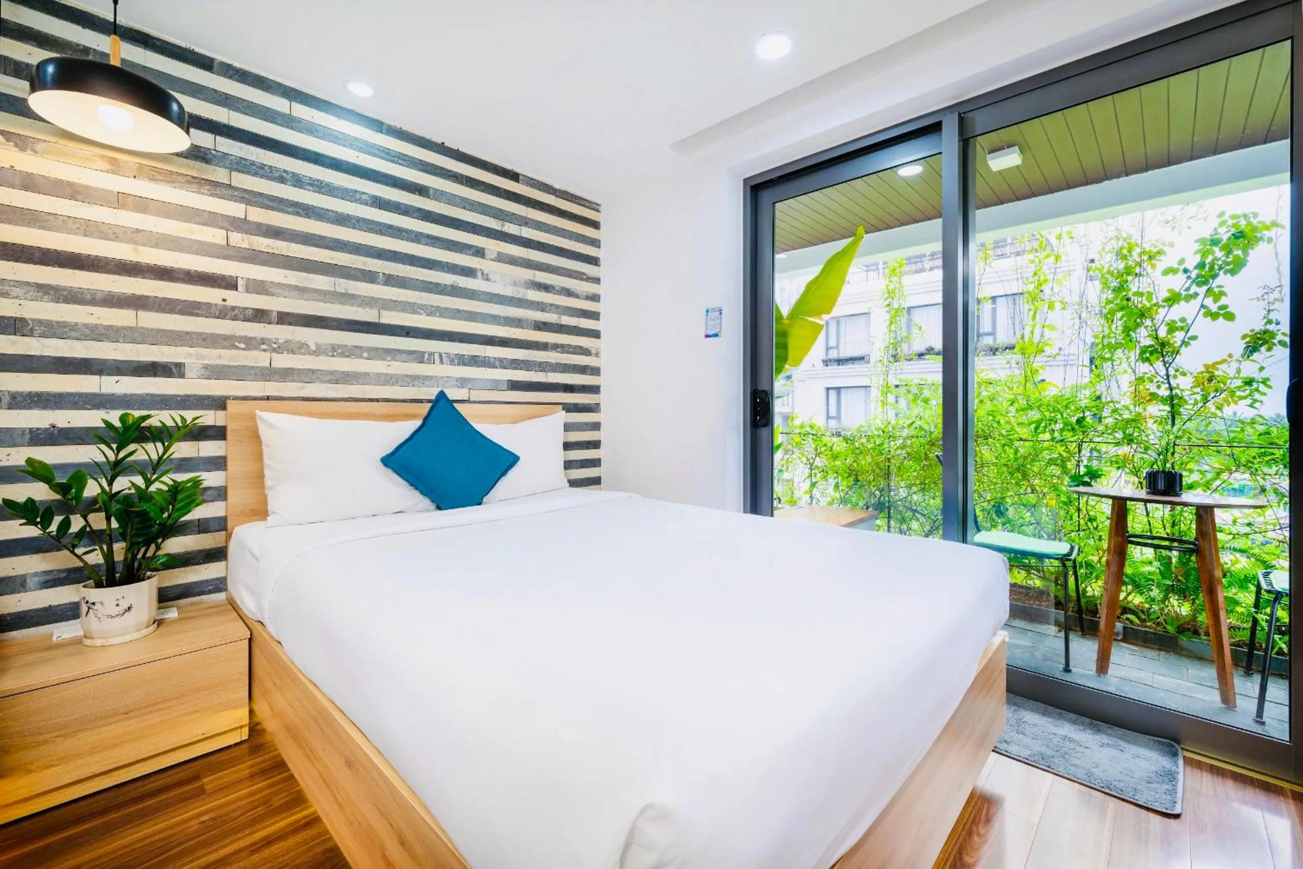 Bed in John Boutique Villa