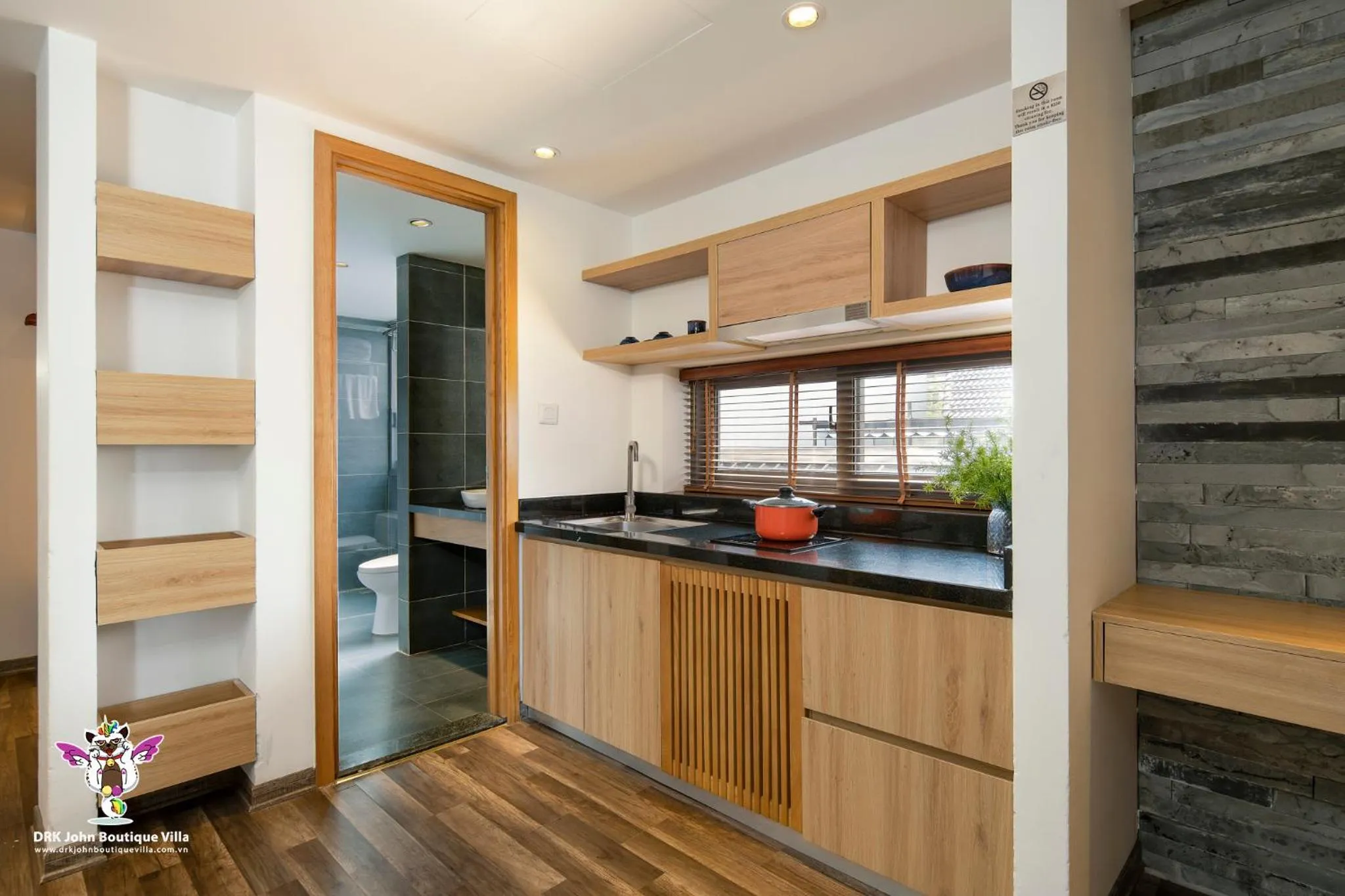 Kitchen or kitchenette in John Boutique Villa