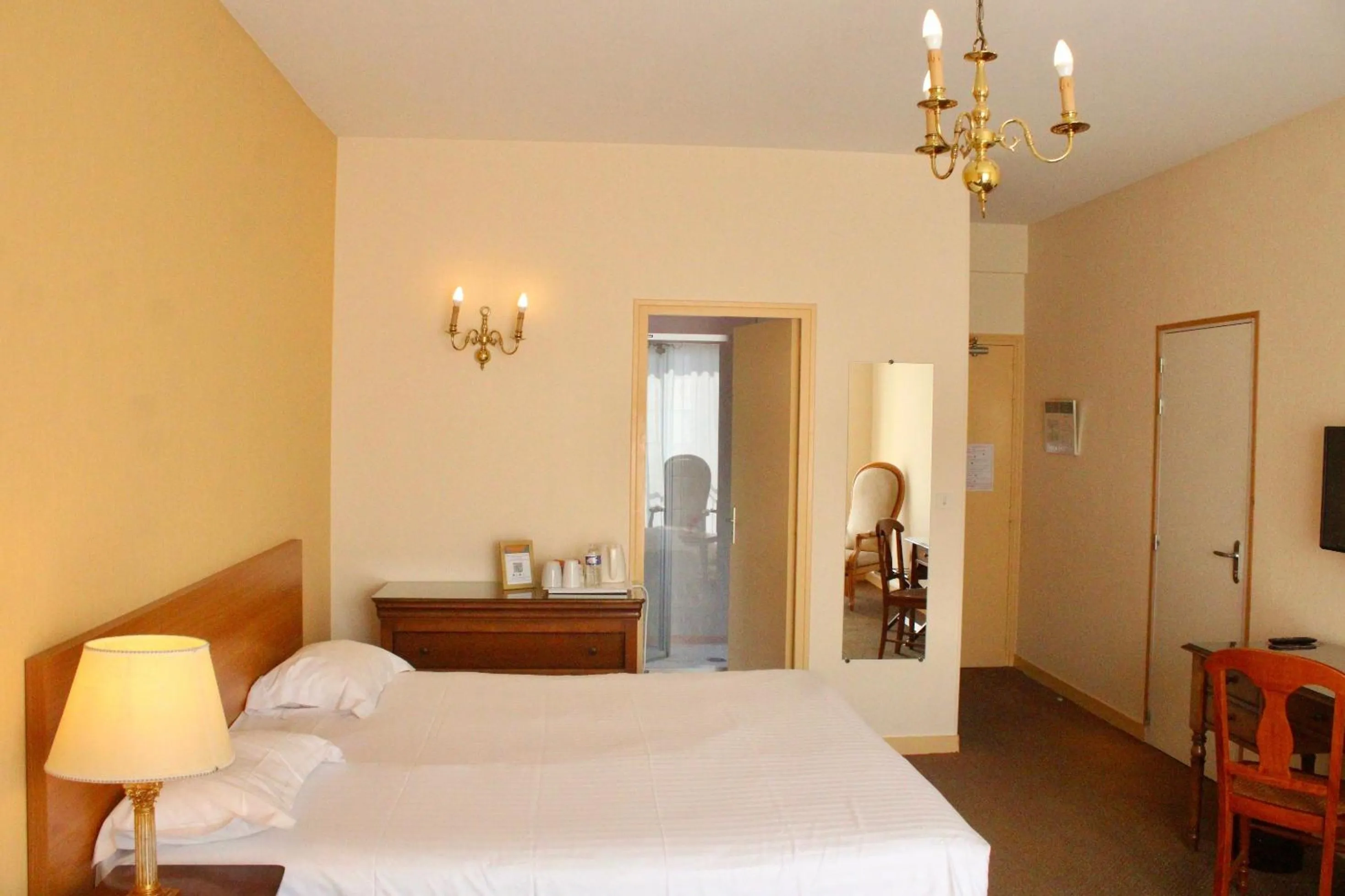 Bed in Hôtel de la Marine