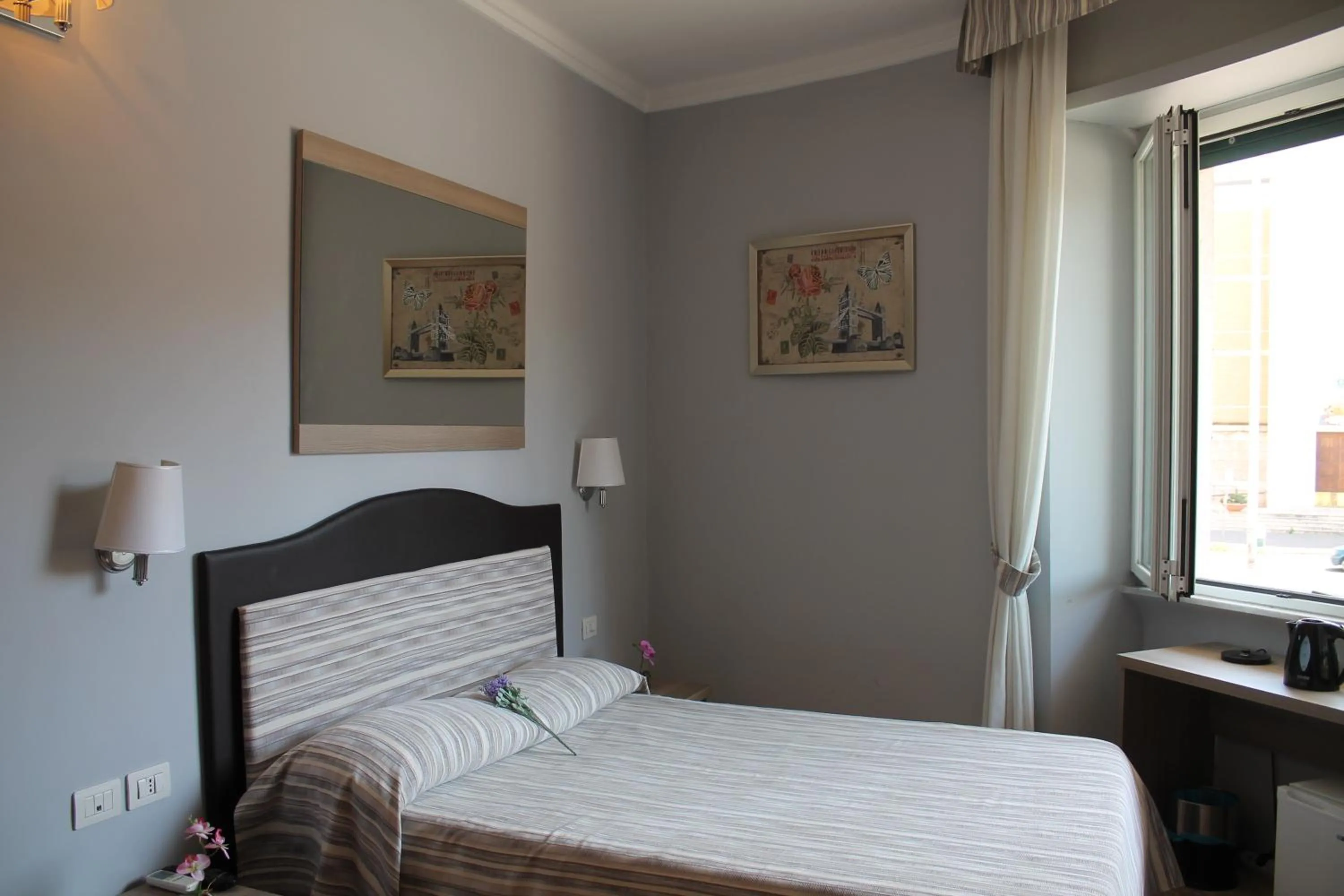 Bed in St. Anthony Guest House