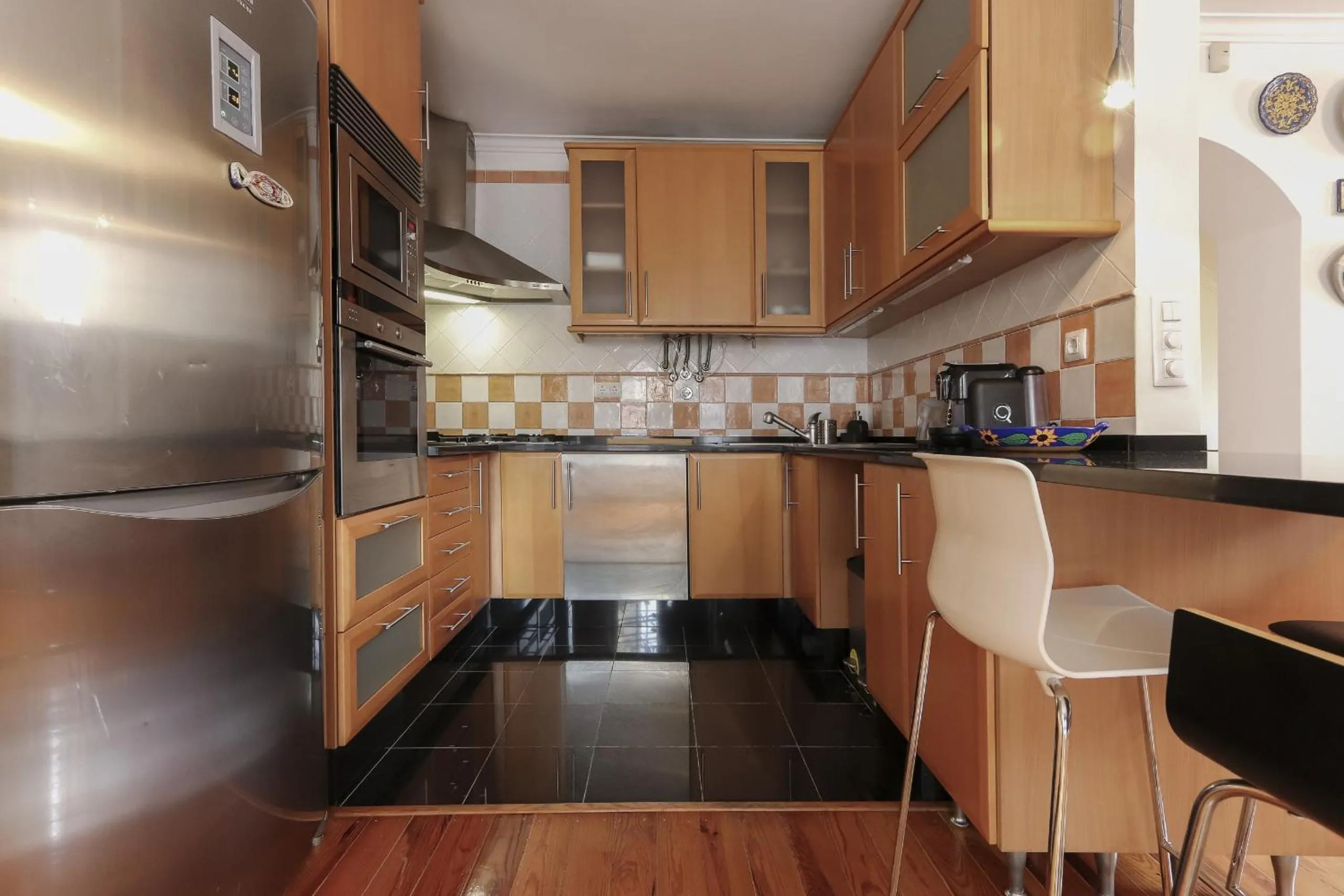 Kitchen or kitchenette in Grand Parliament Duplex by Homing
