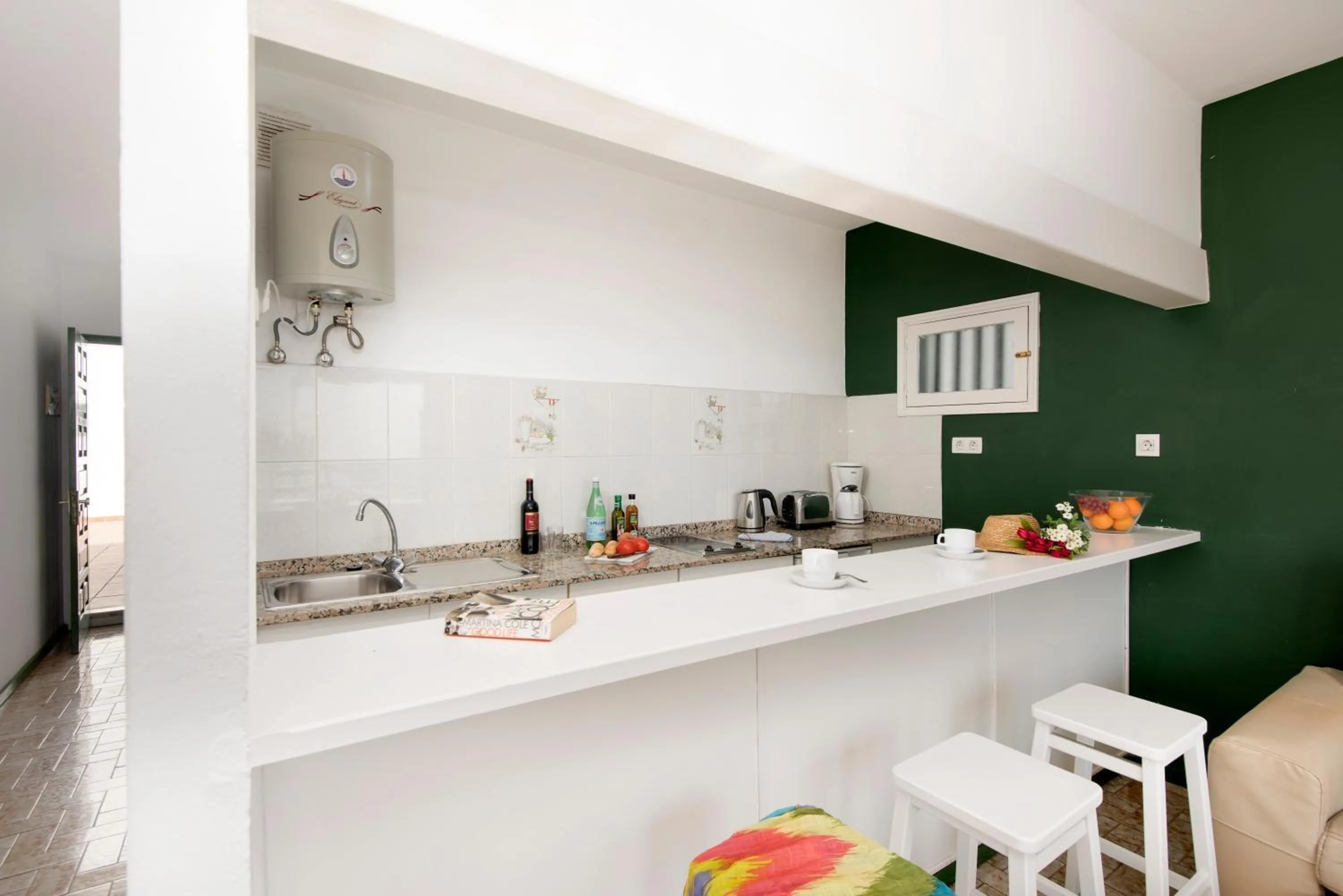 Kitchen or kitchenette in Rocas Blancas Apartments