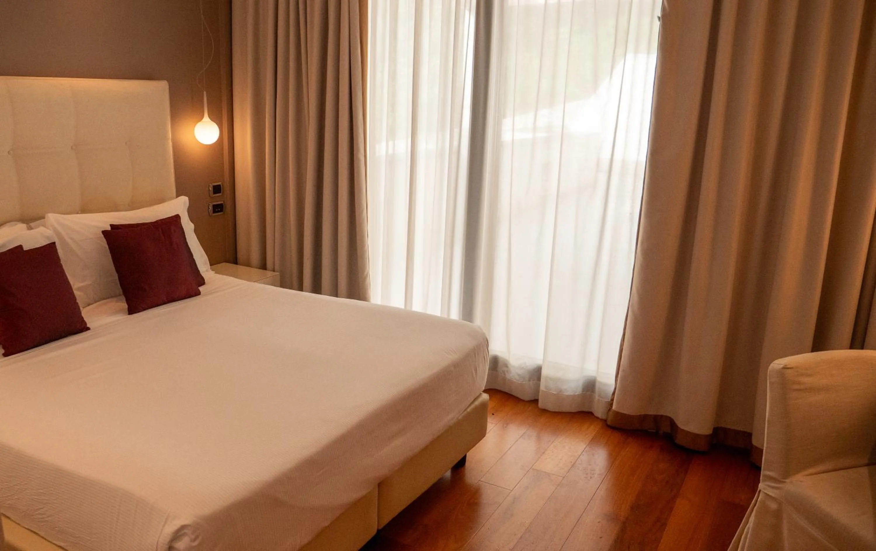 Bed in Relais Paradiso