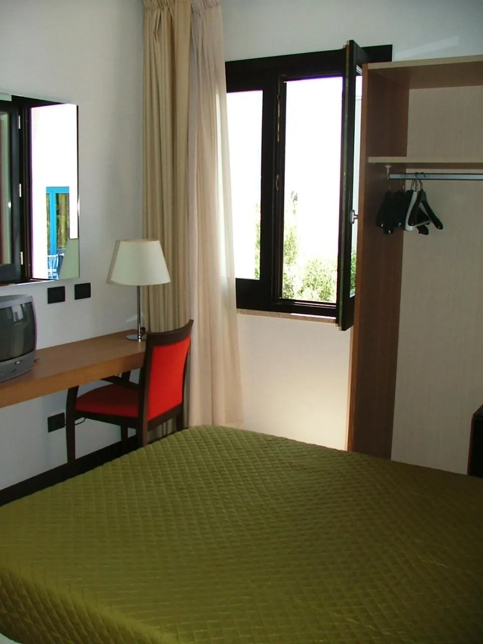 Bed in Villa Faro B&B