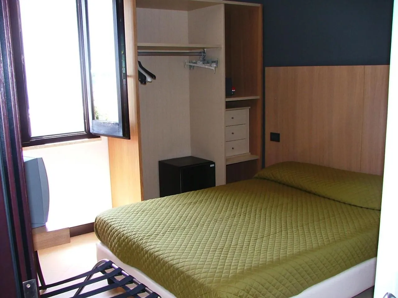 Bedroom in Villa Faro B&B