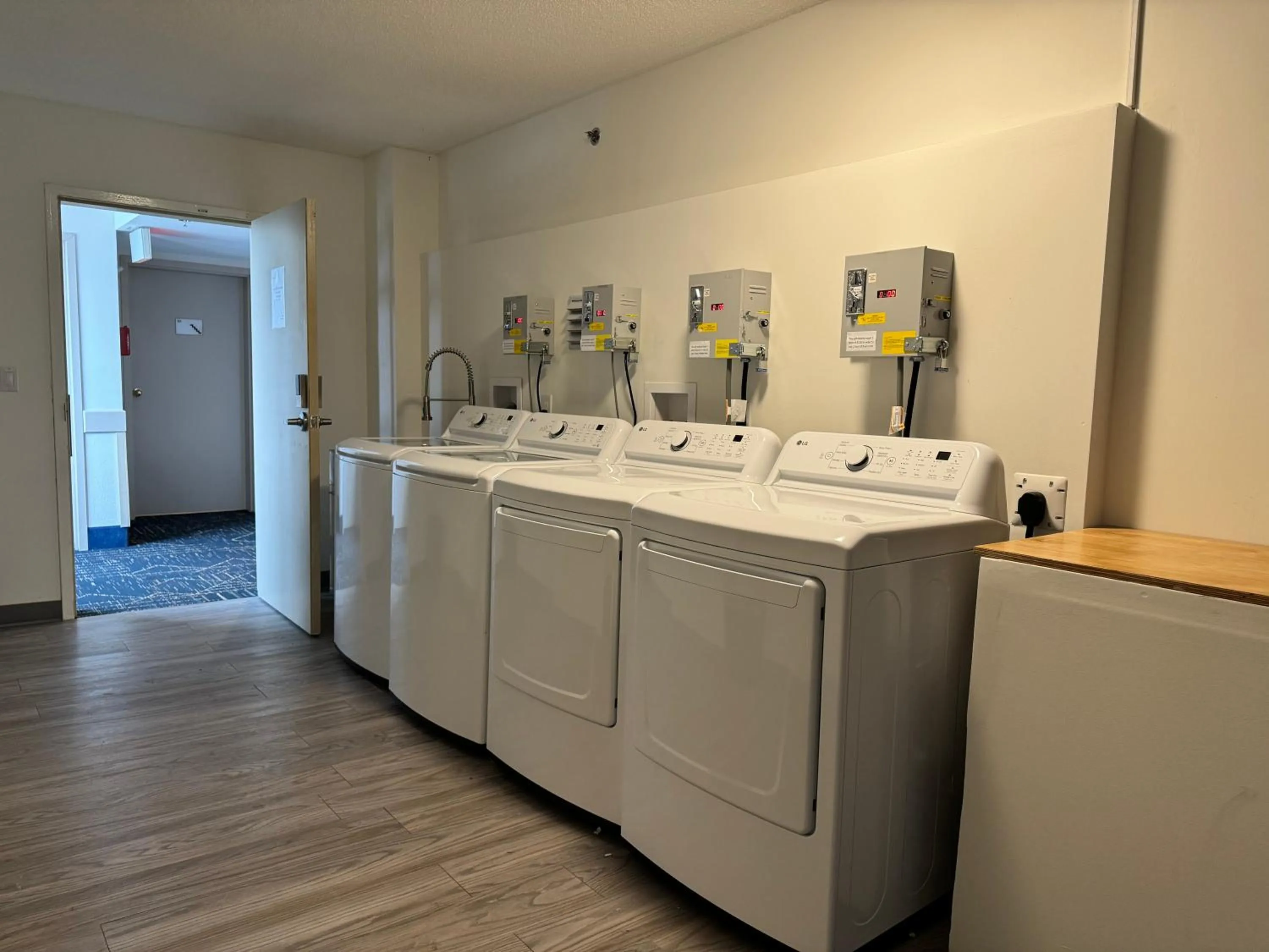 laundry in Divya Sutra Plaza and Conference Centre Calgary Airport
