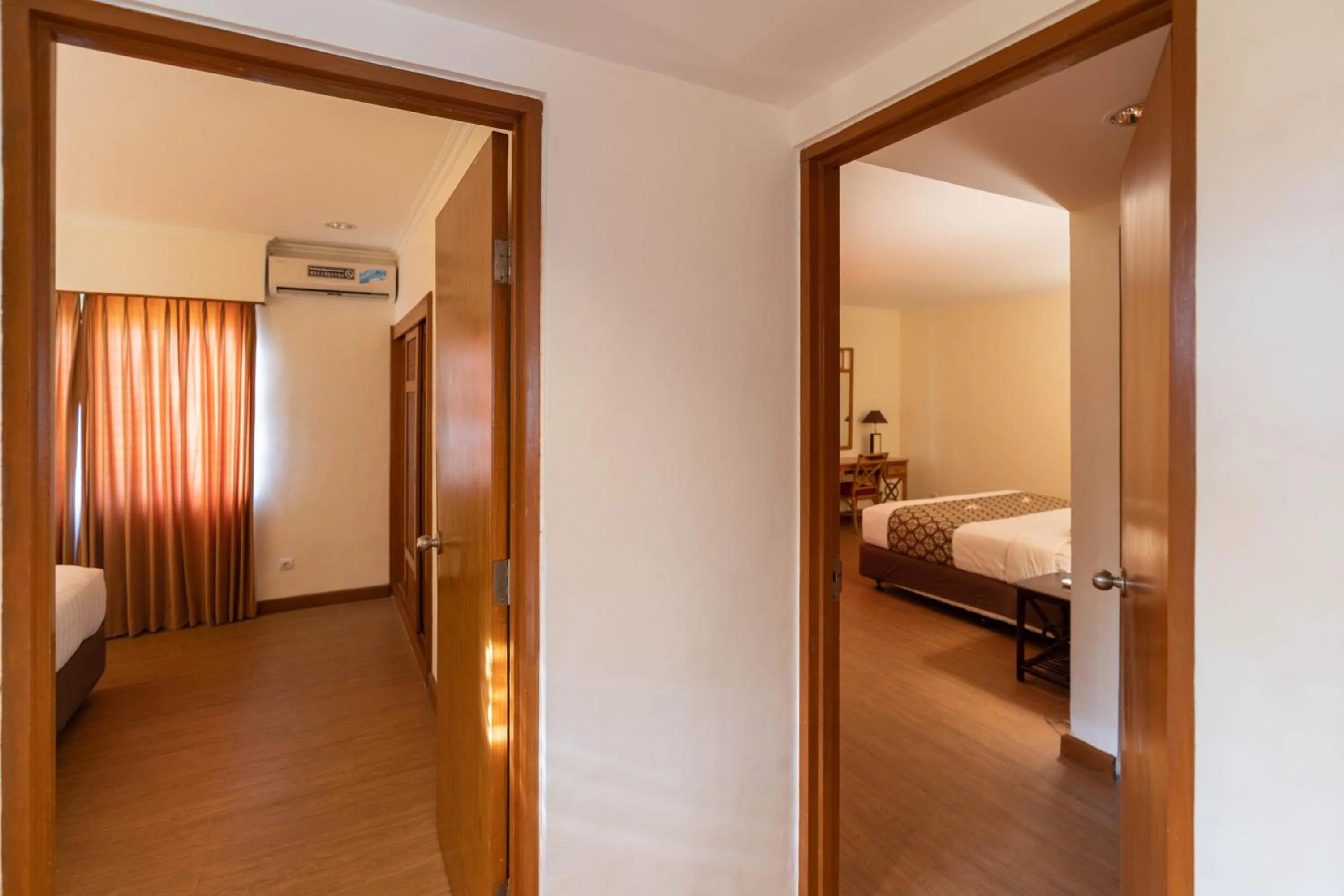 Bed in Plagoo Holiday Hotel