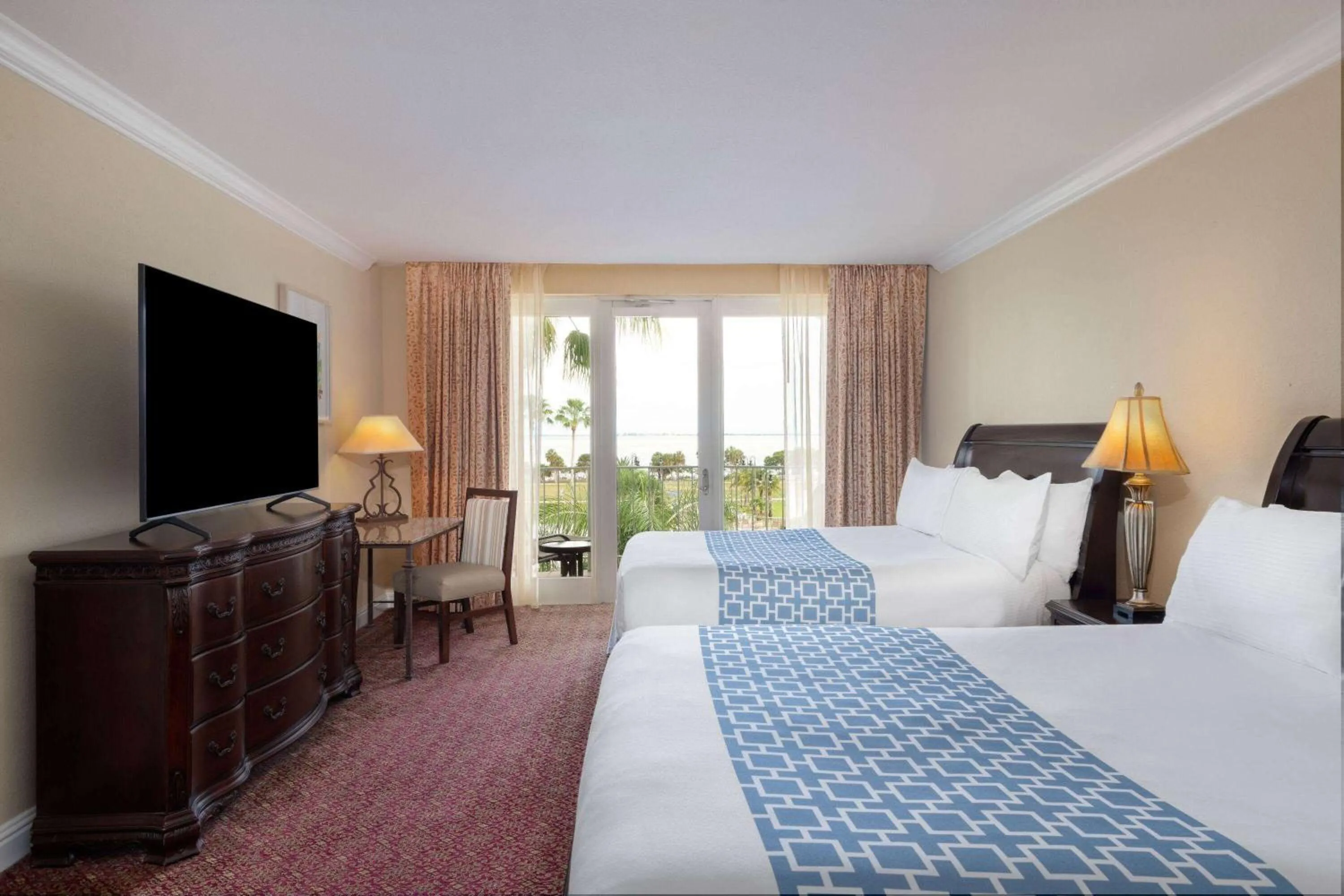 Bed in Safety Harbor Resort & Spa Trademark Collection by Wyndham