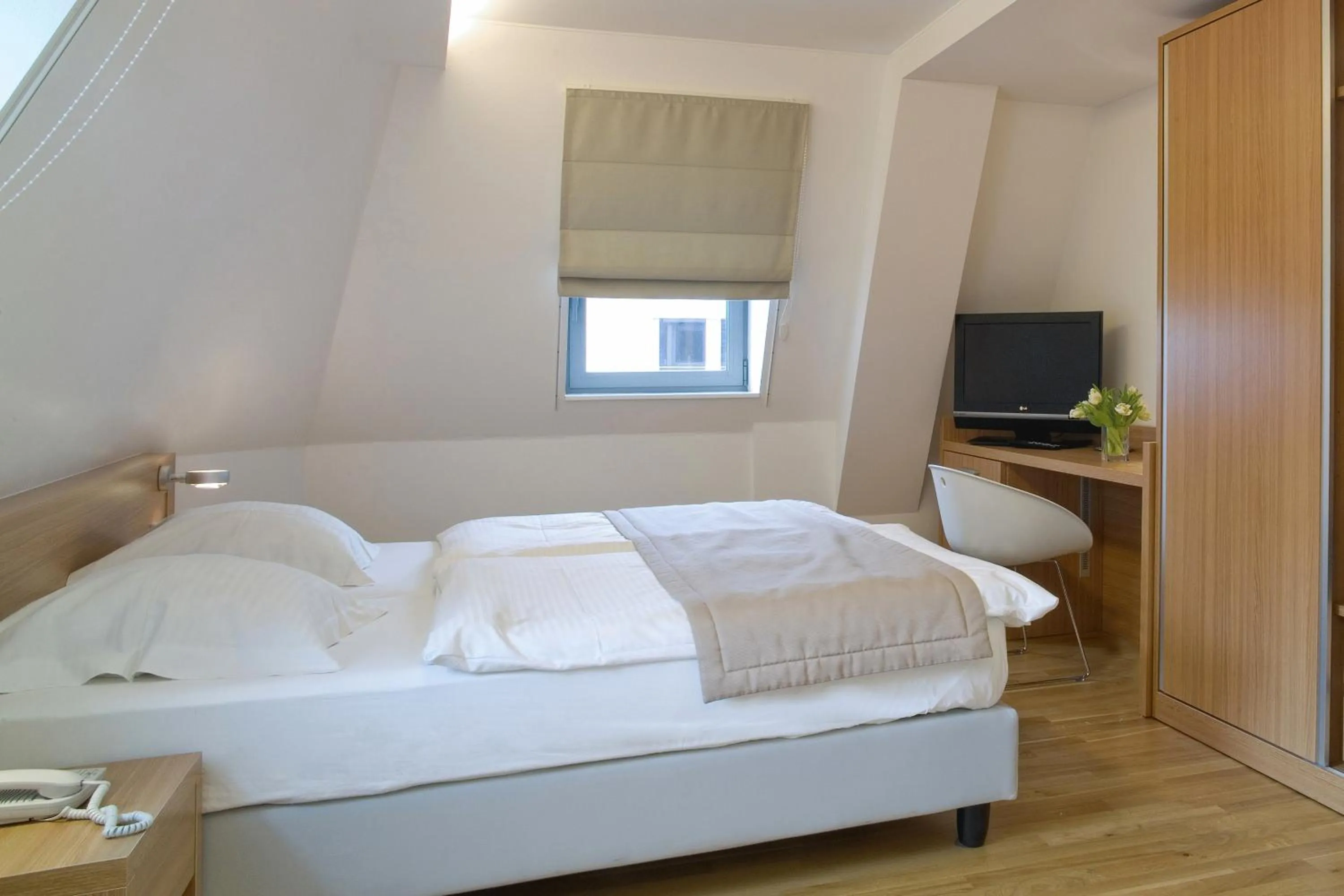 Bed in Hotel Simoncini