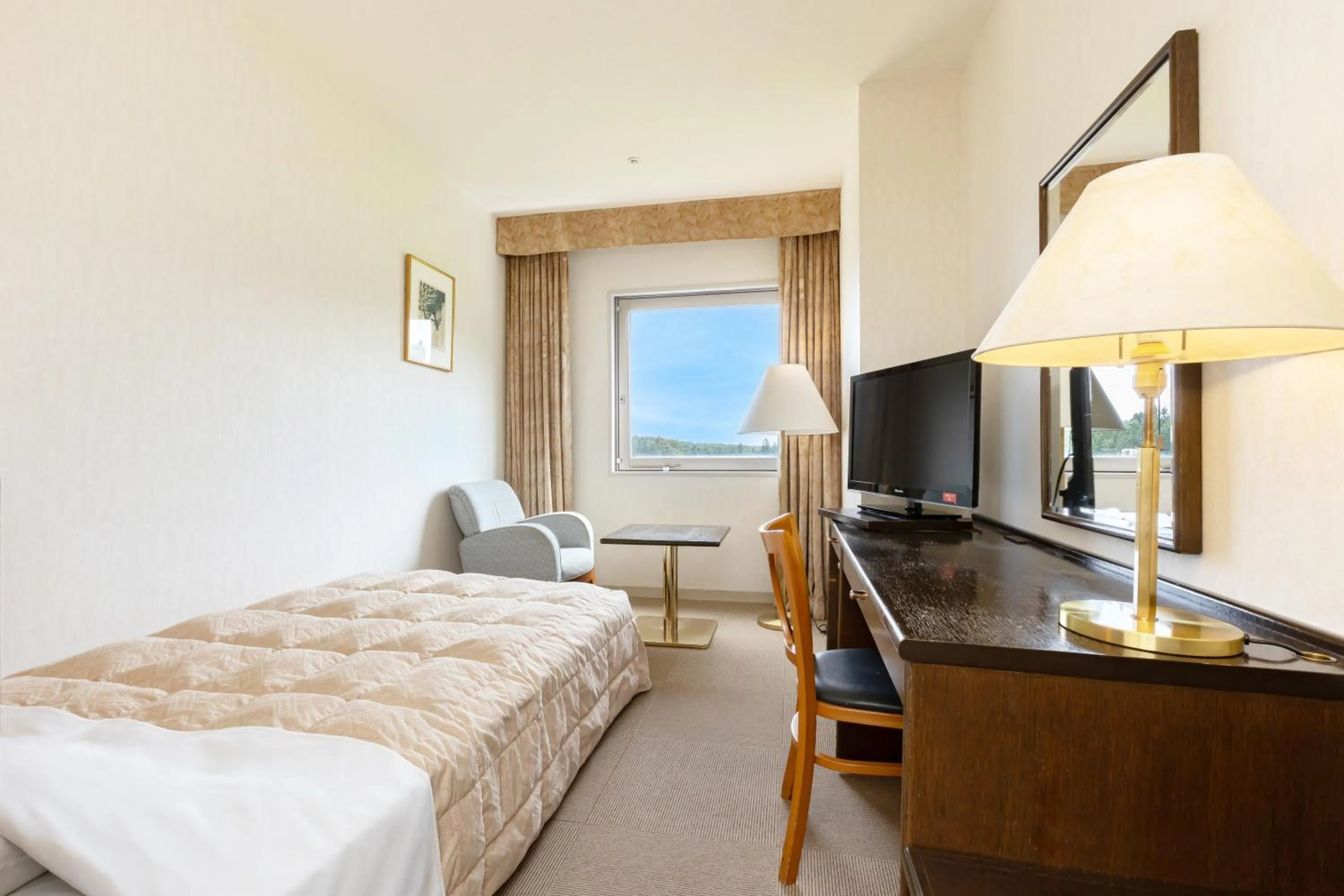 Bed in KAMENOI HOTEL Aomori Makado