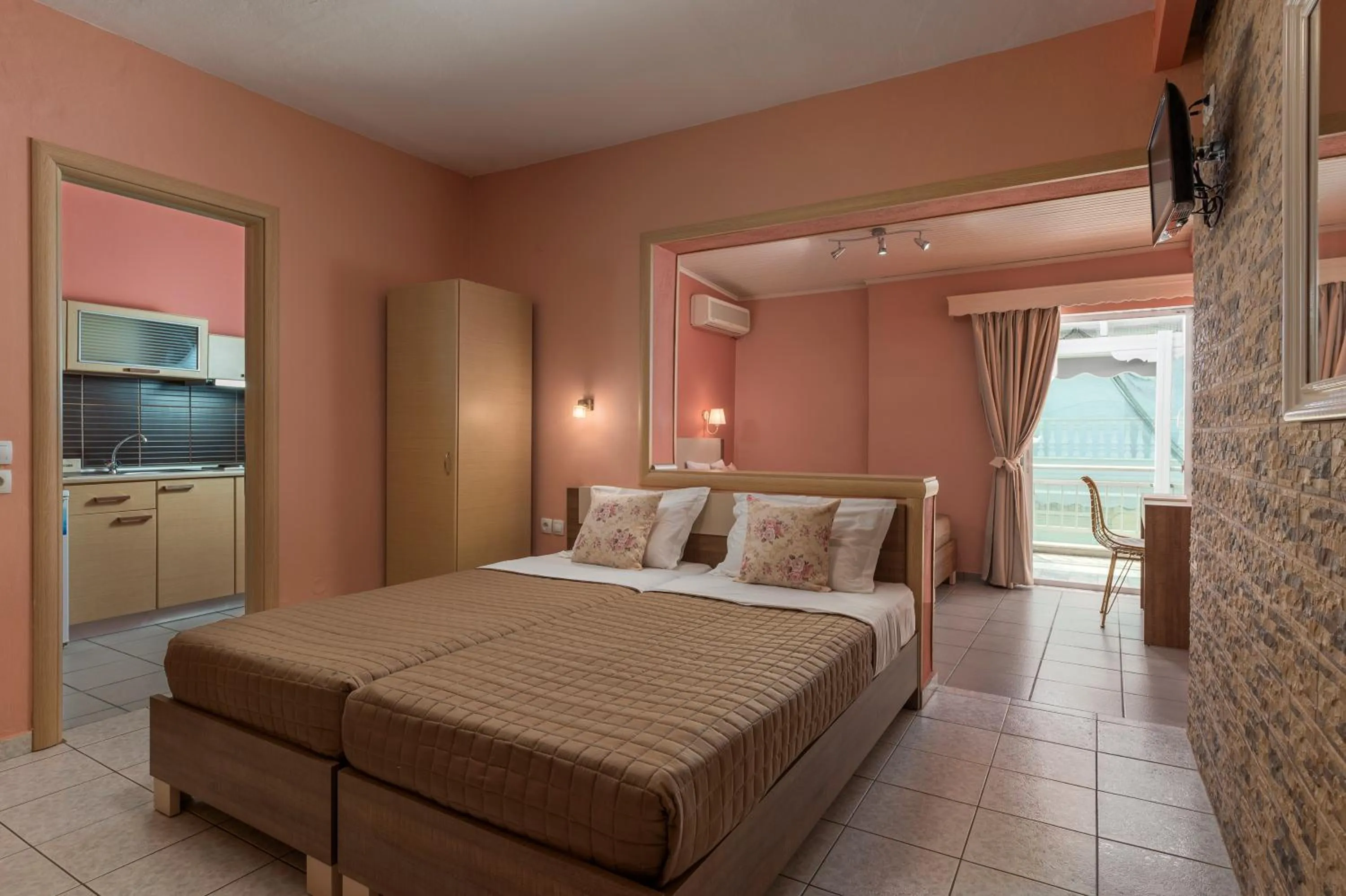 Bed in Ouzas luxury Hotel