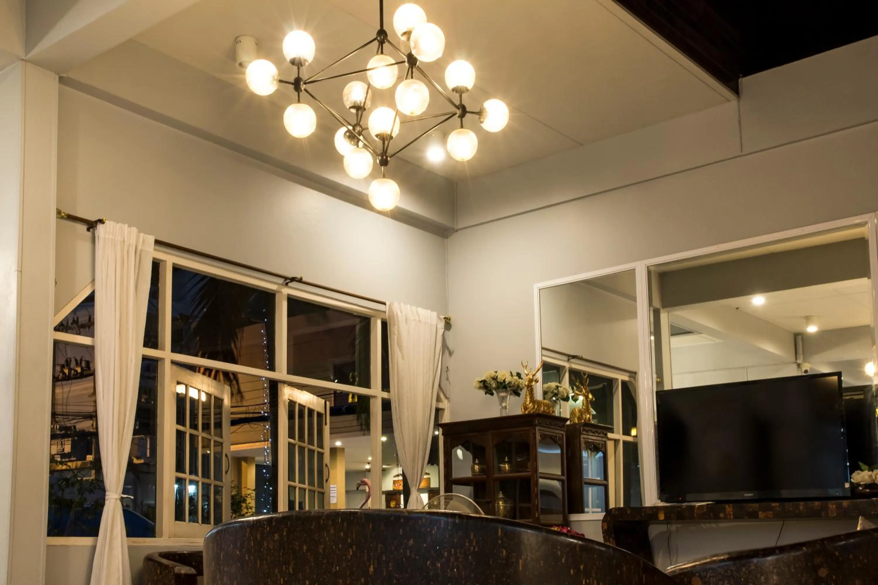 Seating area in S Lodge Pattaya formally Sabai Lodge