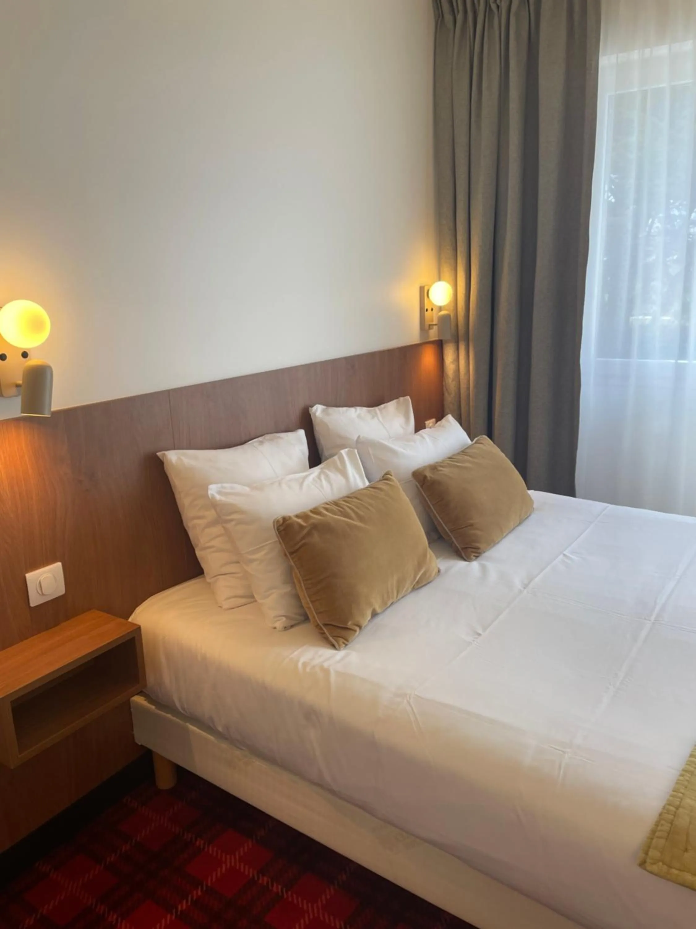 Bed in Hôtel Le Martray