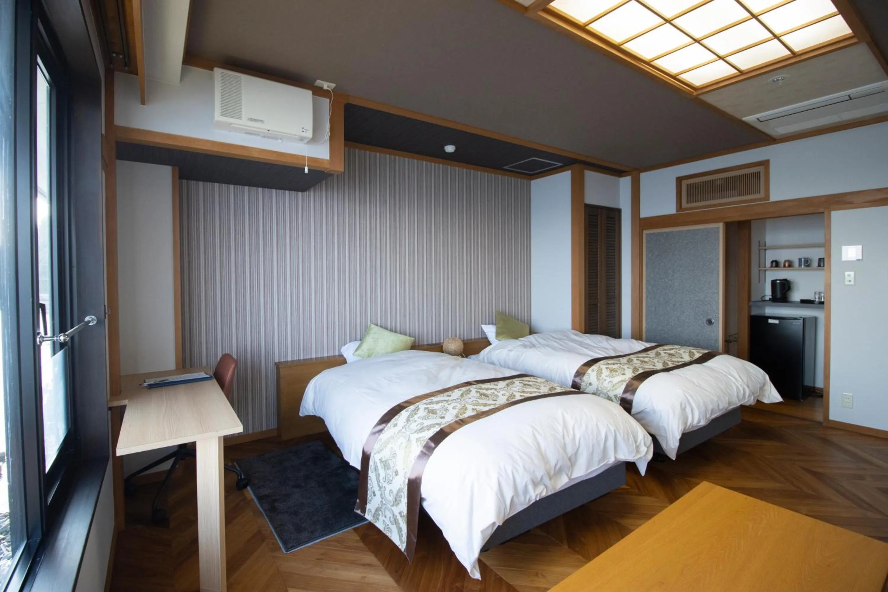 Bed in La se ri Resort and Stay