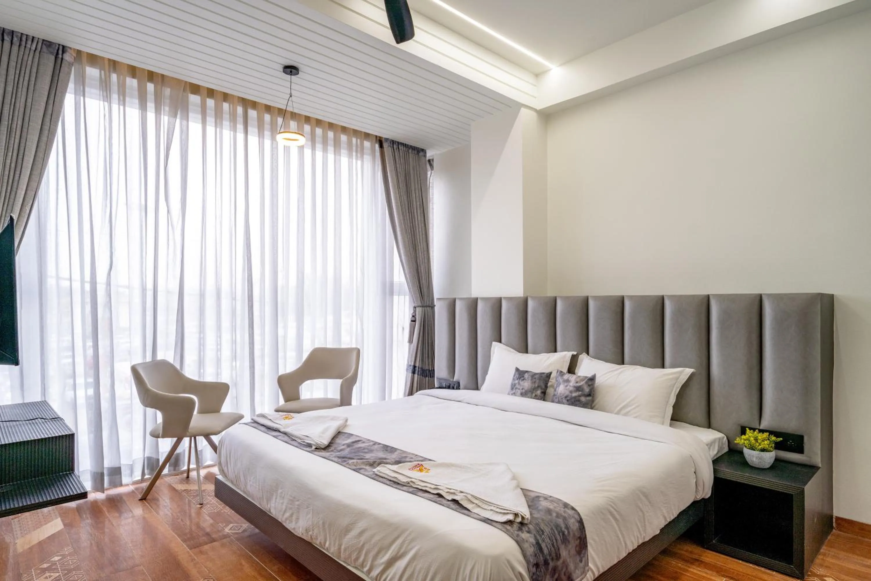 Bed in Hotel Darshan Executive