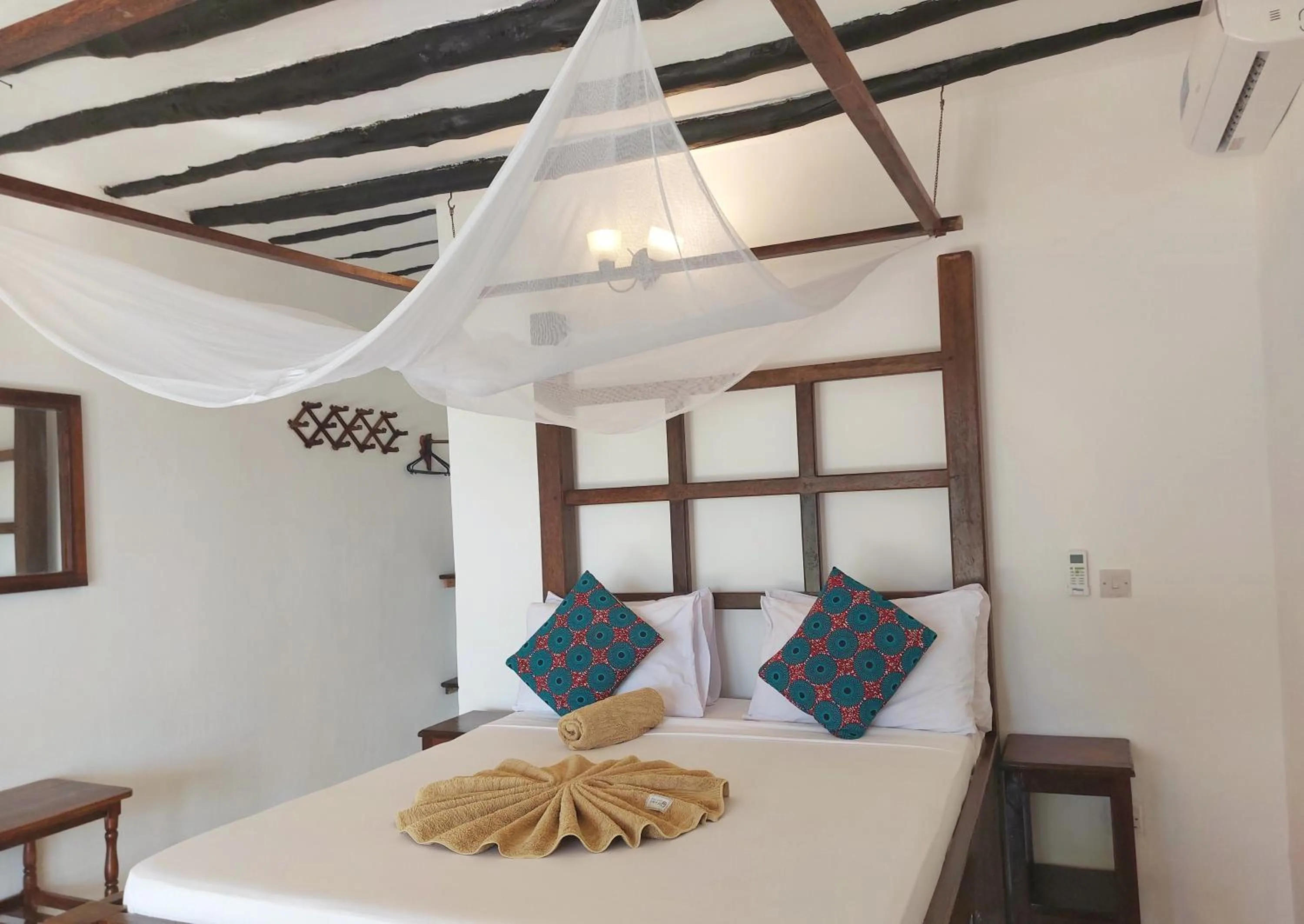 Bed in Jaribu Beach Hotel