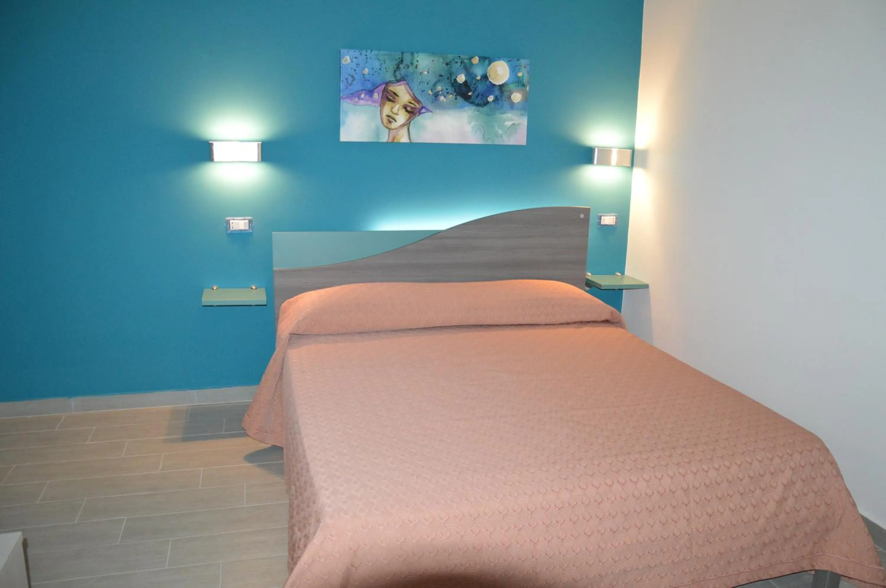 Photo of the whole room, Bed in Good Night Moon B&B