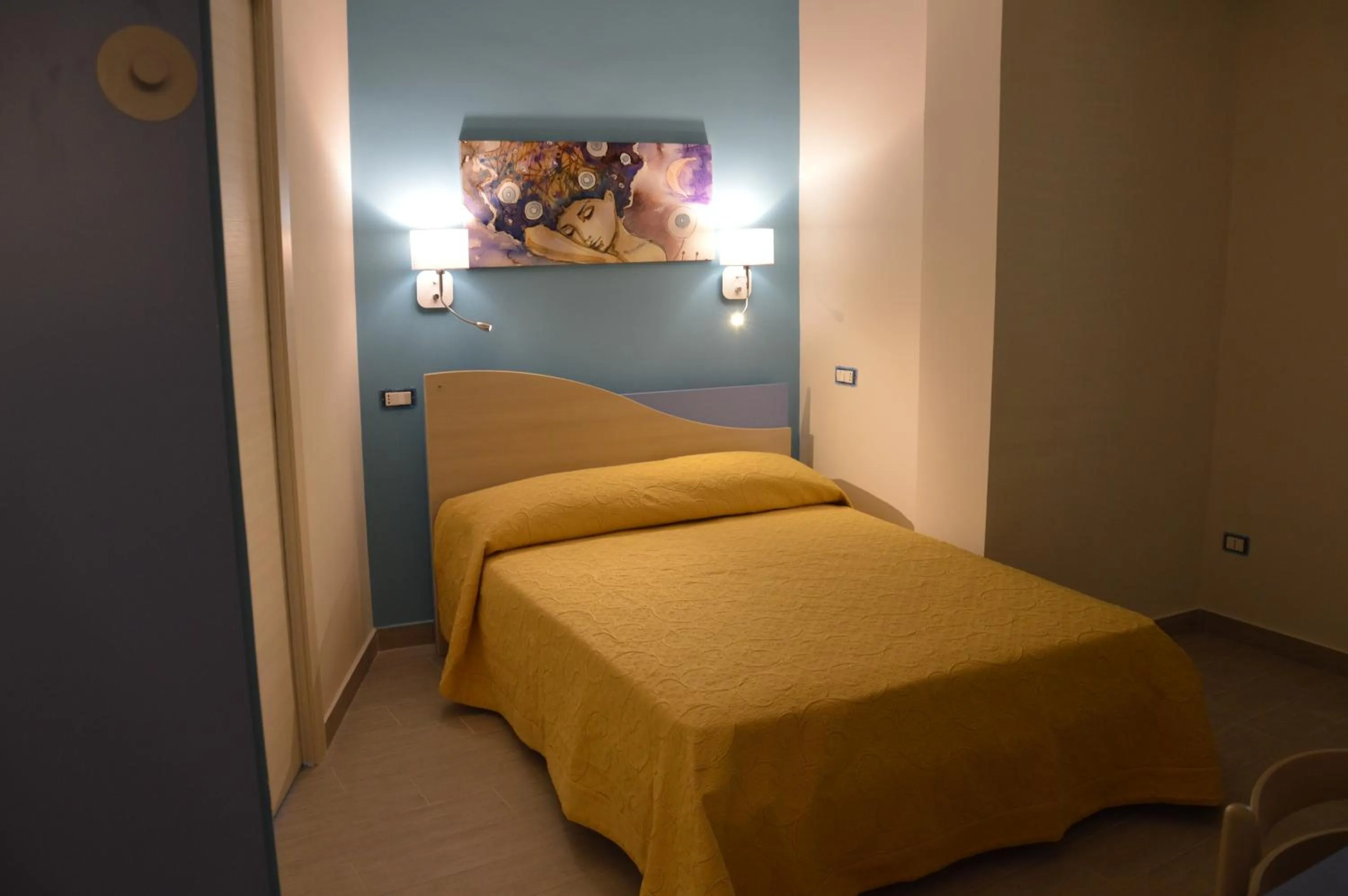 Photo of the whole room, Bed in Good Night Moon B&B