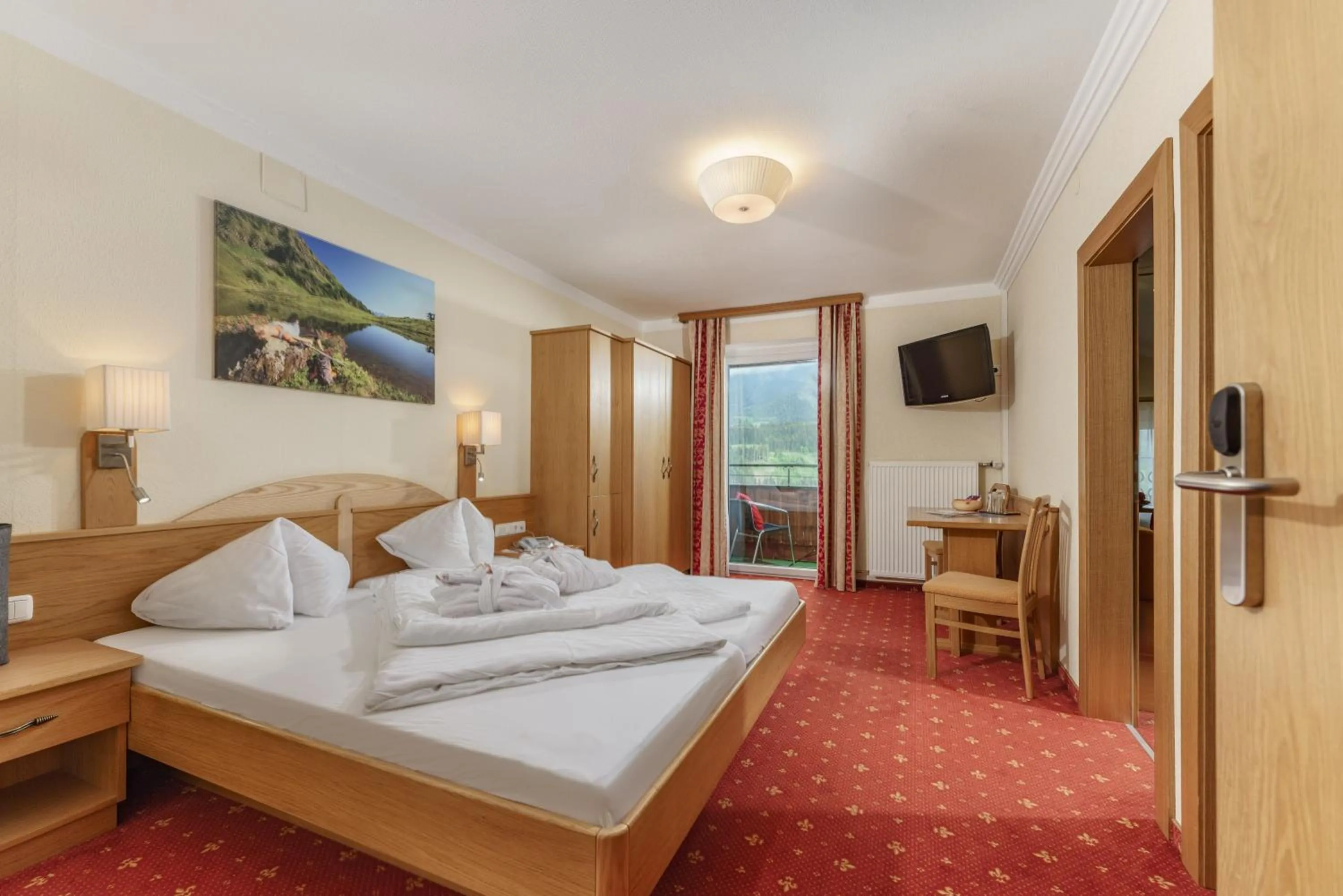 Photo of the whole room, Bed in Panoramahotel Gürtl