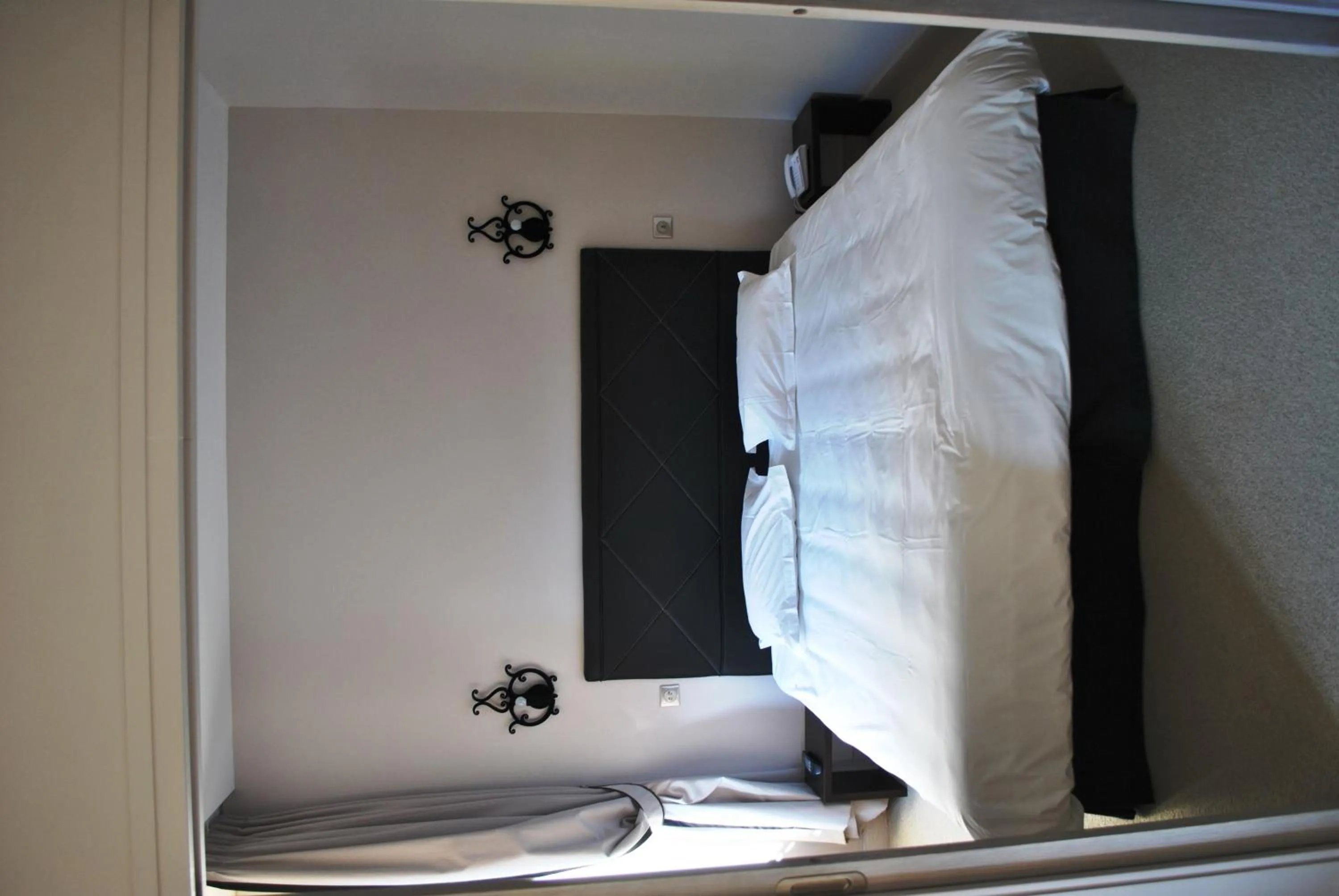 Bedroom in Hôtel Richemond