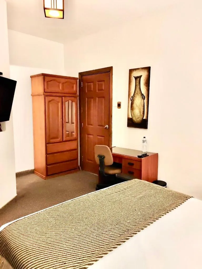 Bed in Casa Bella Boutique Hotel San Isidro