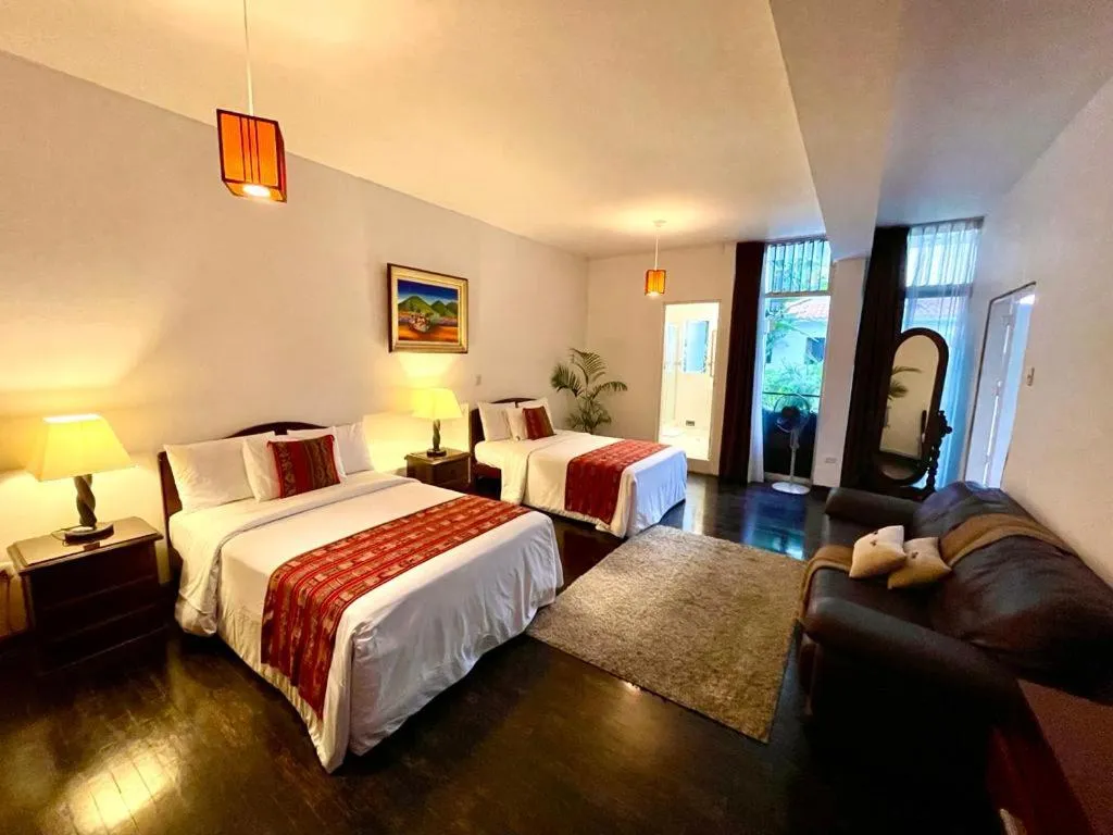 Bed in Casa Bella Boutique Hotel San Isidro