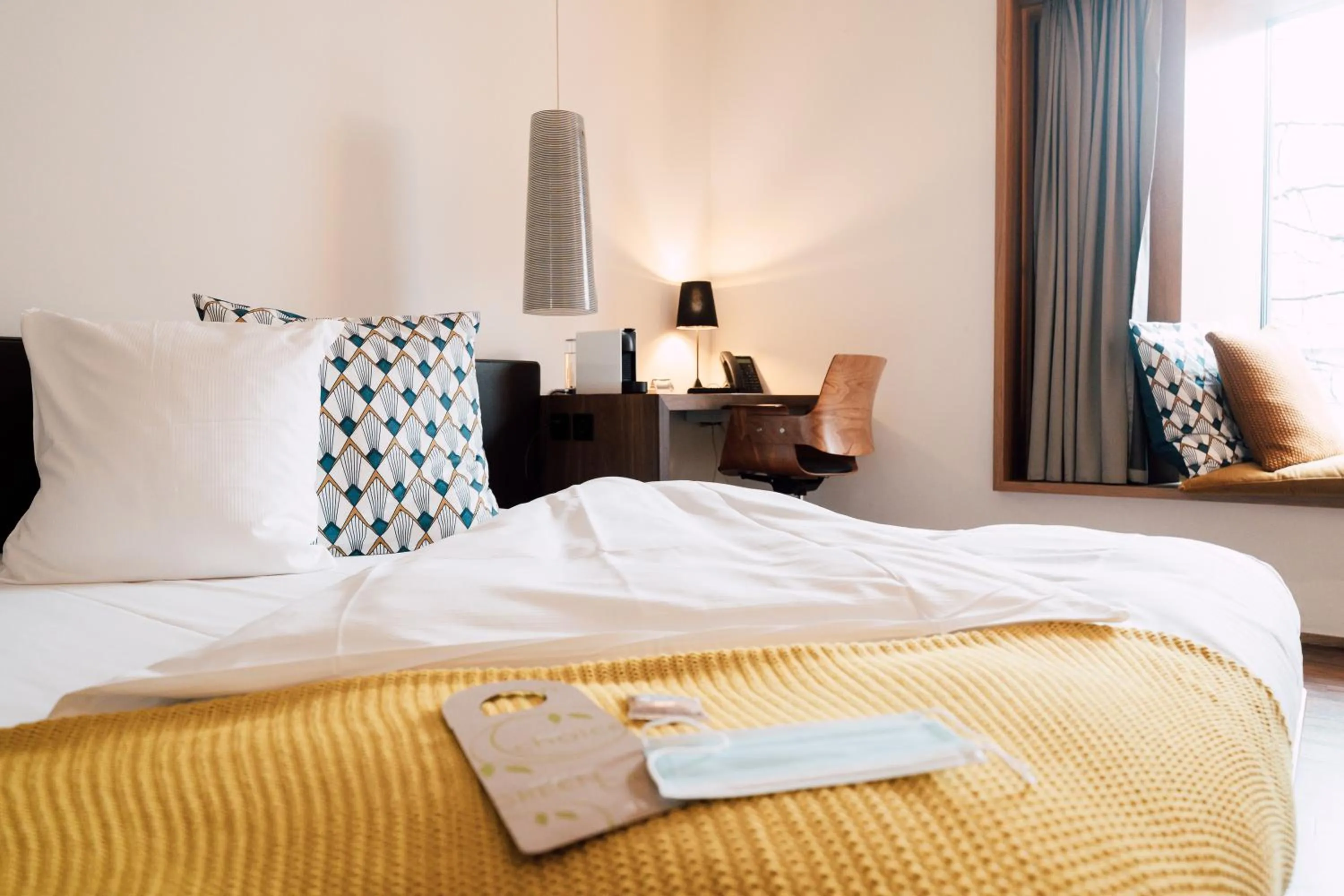 Bed in Blue City Boutique Hotel