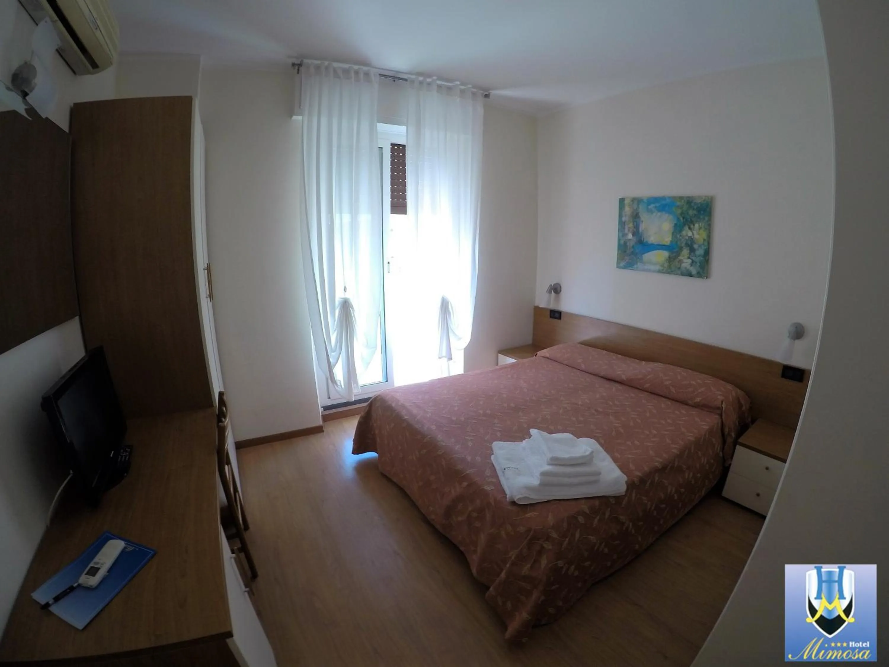 Photo of the whole room in Hotel Mimosa