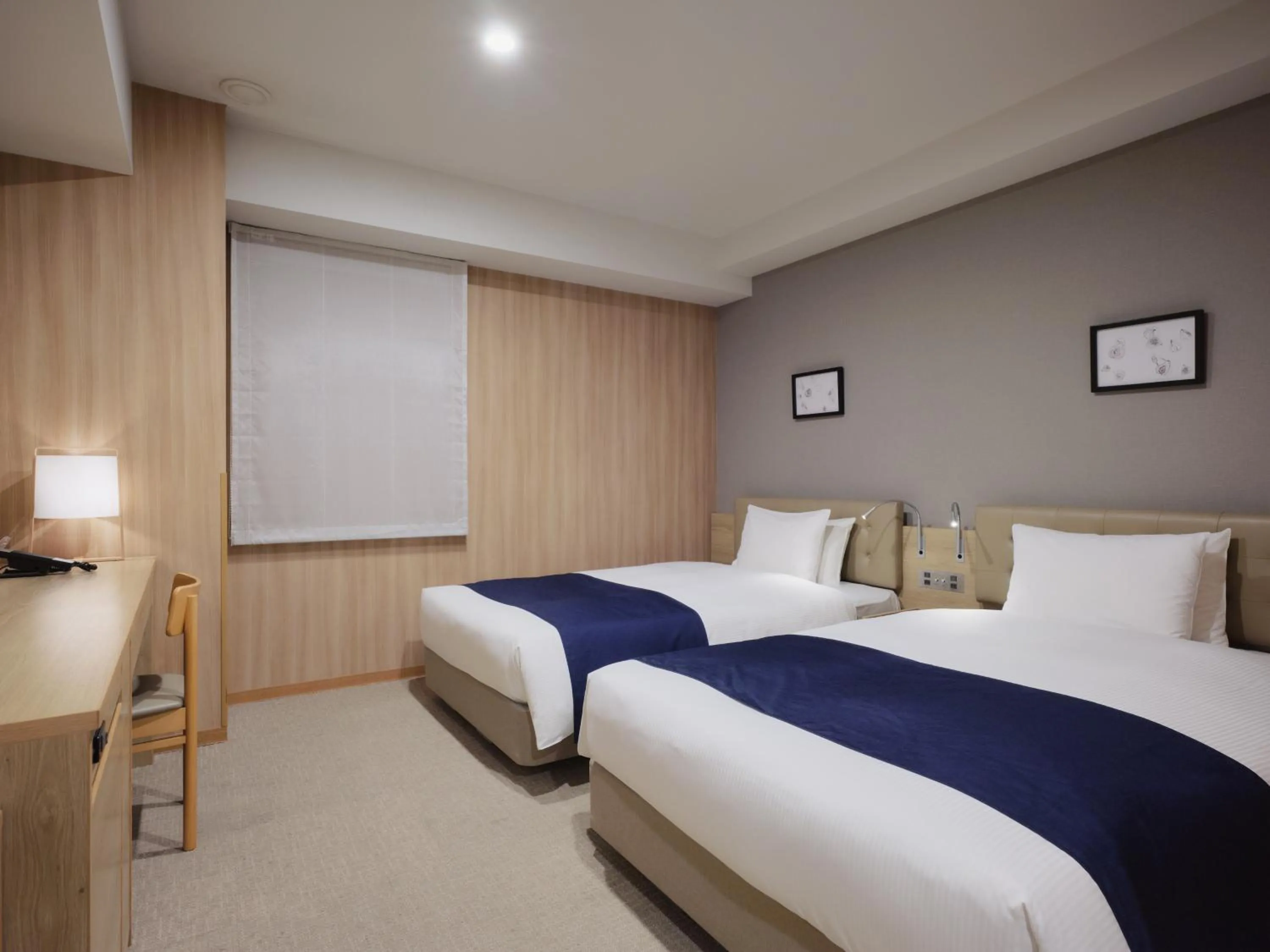 Bed in hotel MONday Haneda Airport