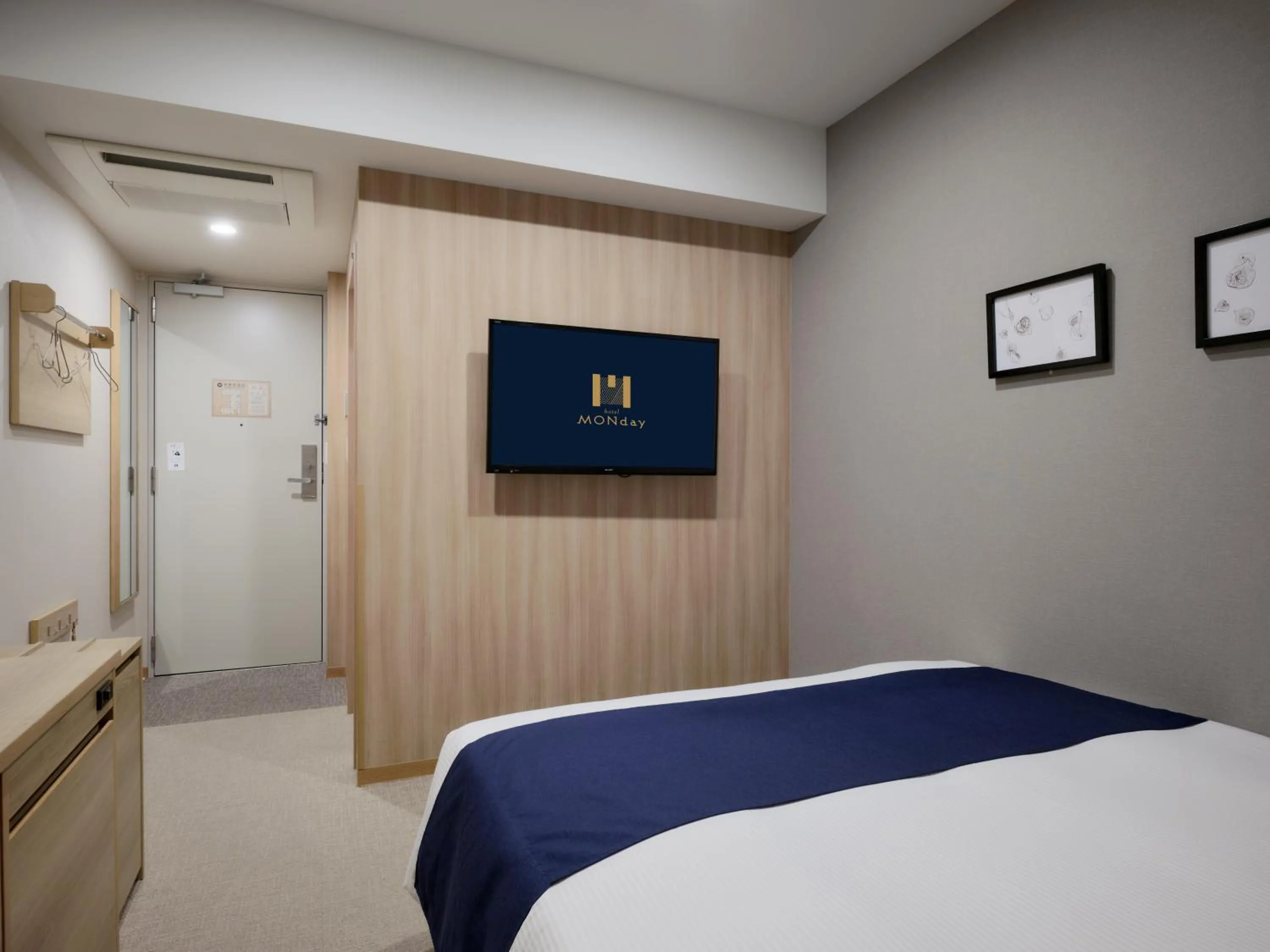 Bed in hotel MONday Haneda Airport