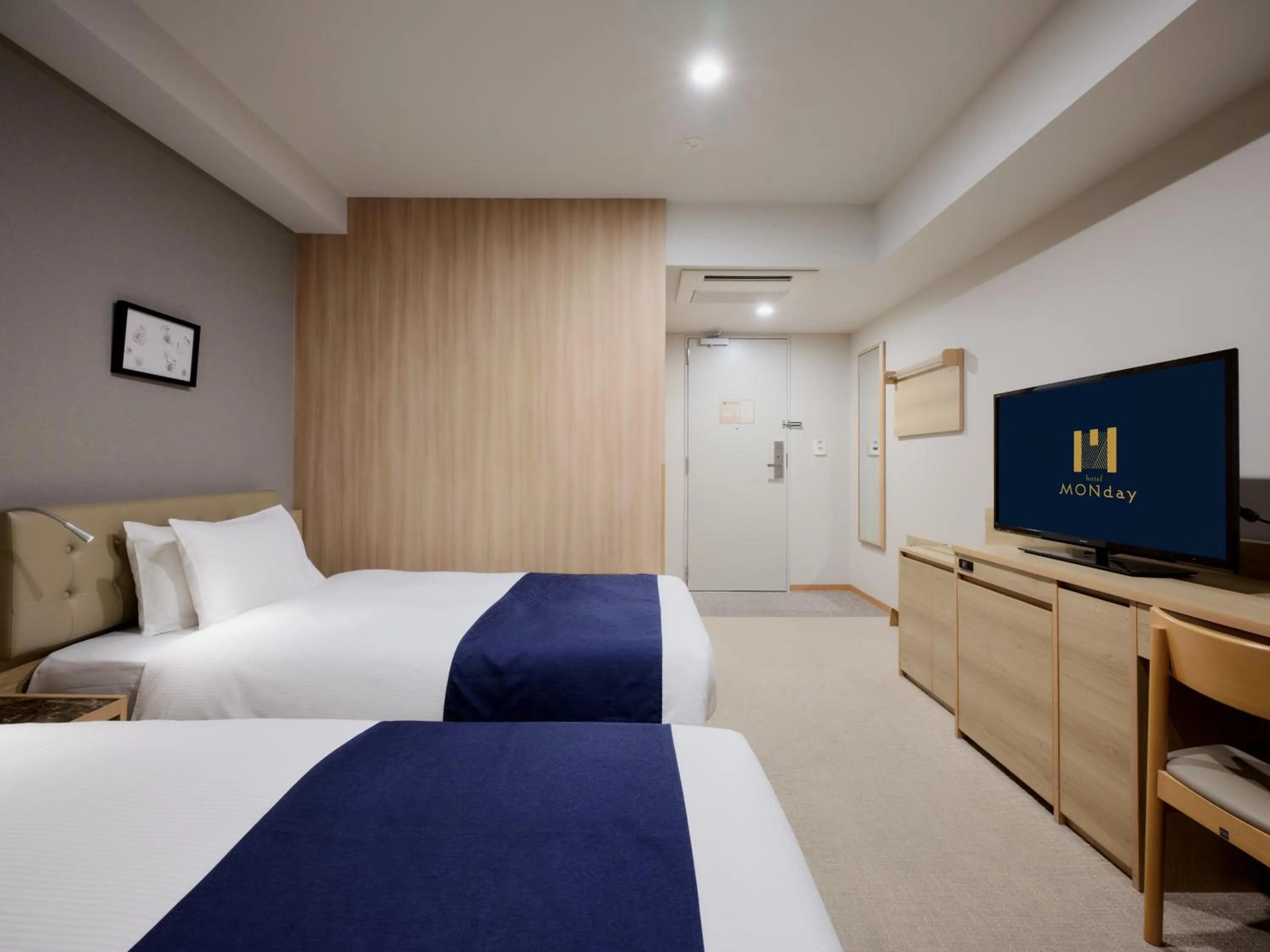 Bed in hotel MONday Haneda Airport